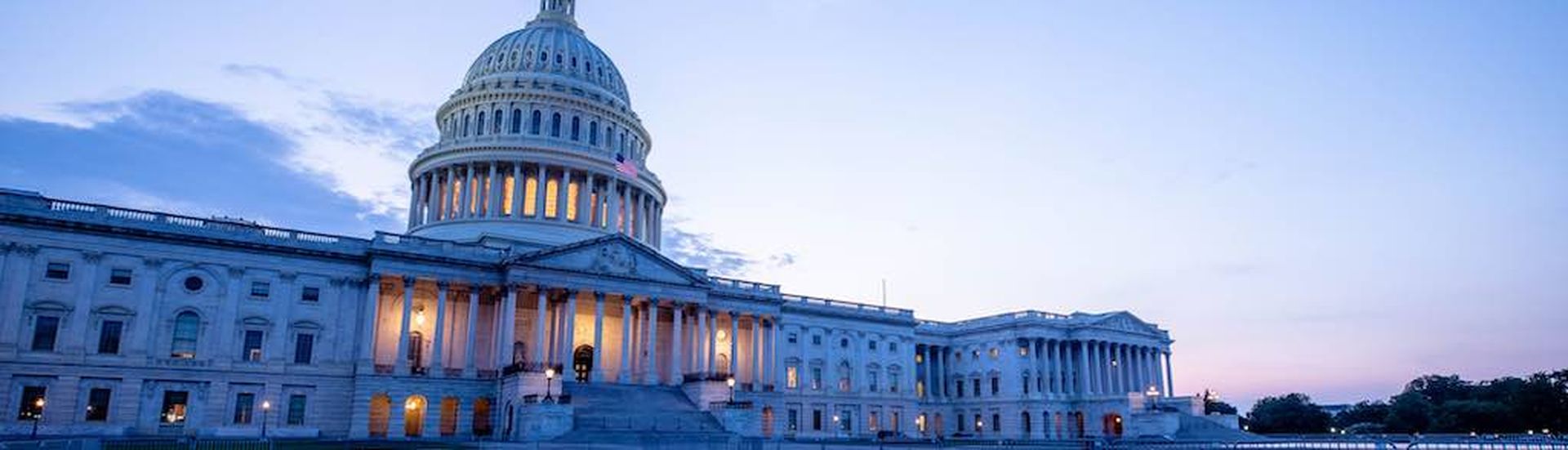 The US Capitol Building at dusk.