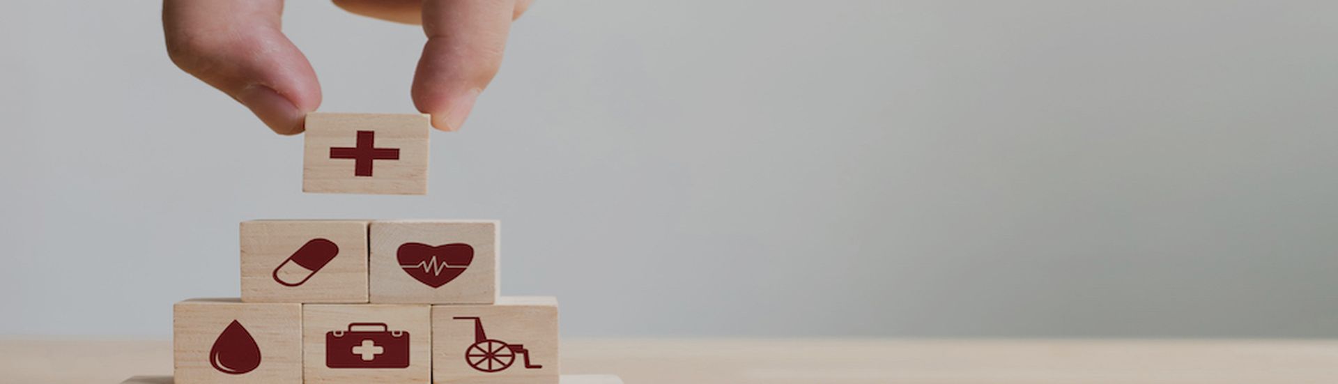 Hand arranging wood block stacking with icon healthcare medical, Insurance for your health concept