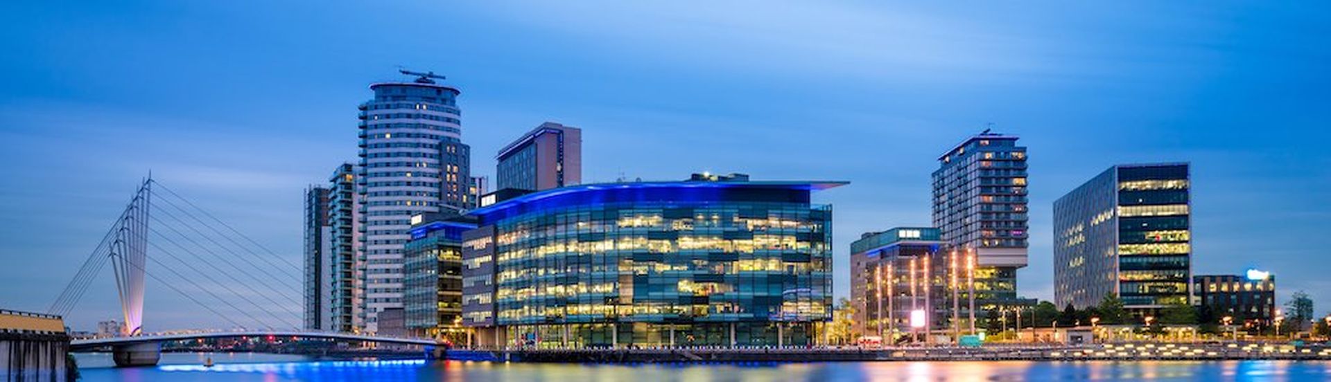 Sunset view over Media City at Salford Quays in Manchester, United Kingdom which is home to studios and offices of major British television companies