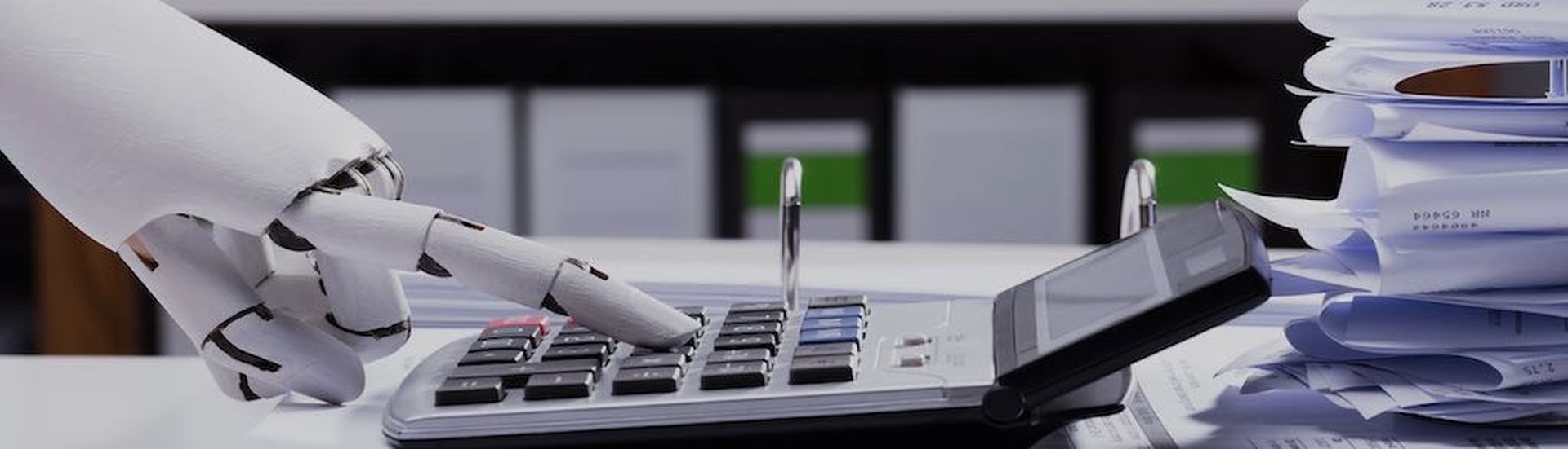 Close-up Of A Robotic Hand Using Calculator