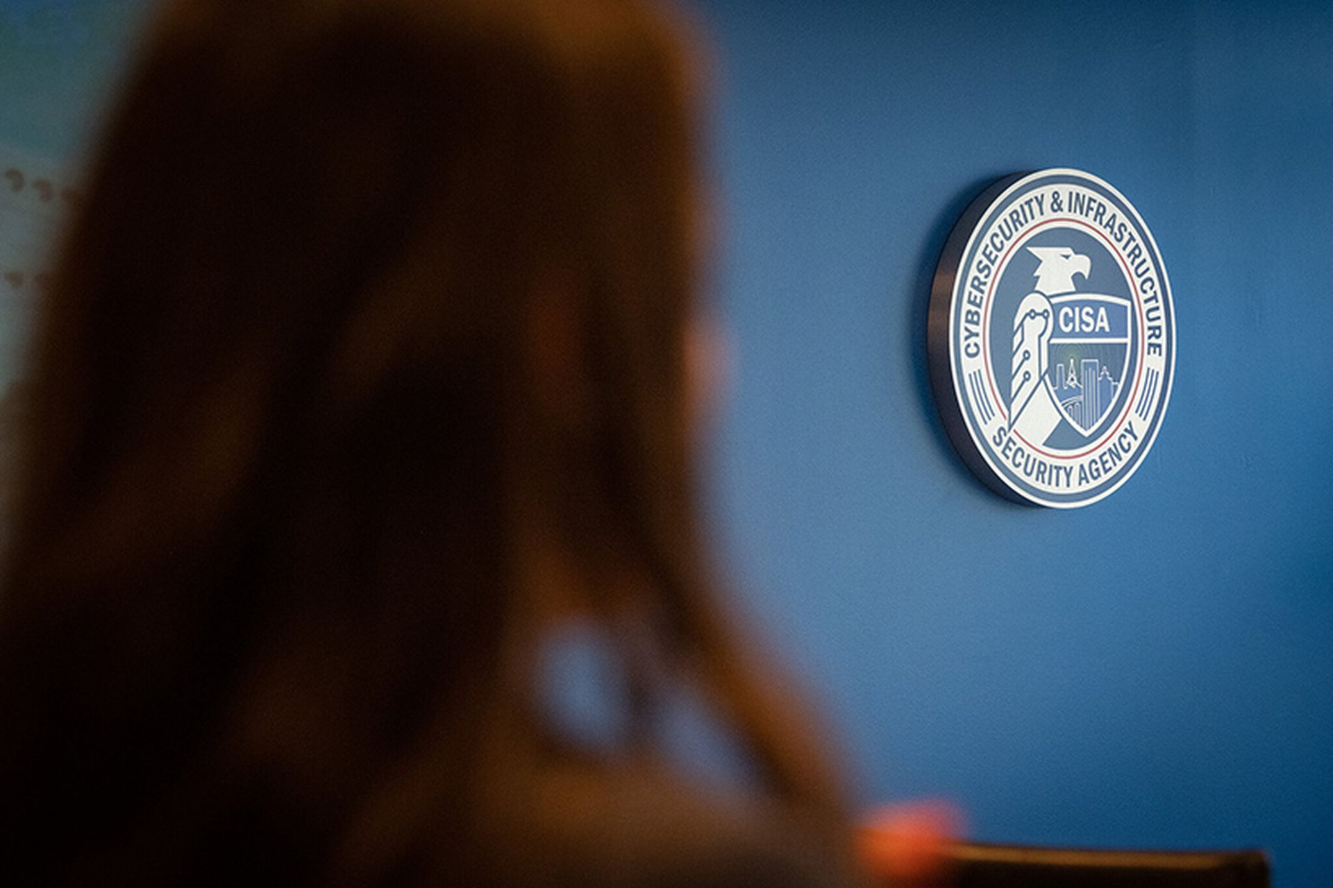 The Cybersecurity and Infrastructure Security Agency (CISA) emblem is seen at its headquarters in Arlington, Va.