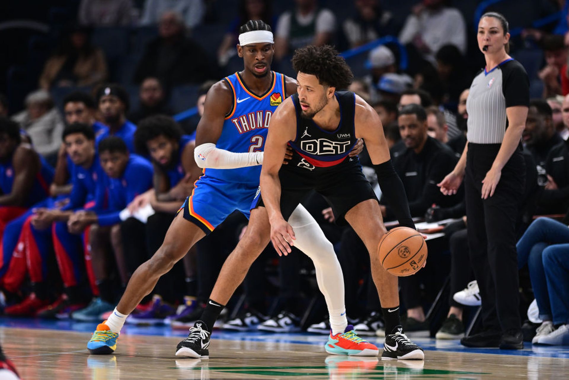 OKLAHOMA CITY, OKLAHOMA &#8211; OCTOBER 30: Cade Cunningham #2 of the Detroit Pistons handles the ball while being defended by Shai Gilgeous-Alexander #2 of the Oklahoma City Thunder at Paycom Center on October 30, 2023 in Oklahoma City, Oklahoma. NOTE TO USER: User expressly acknowledges and agrees that, by downloading and or using this photograph...