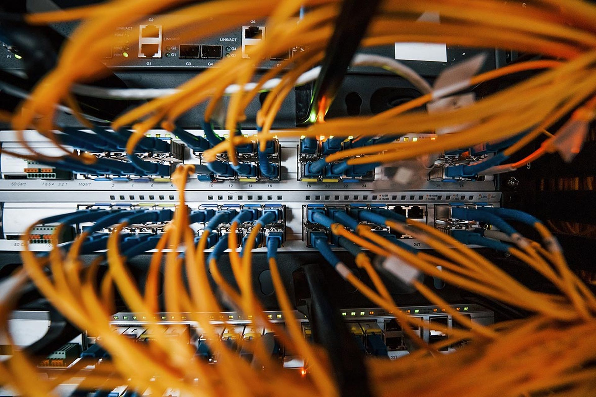 Close up view of internet equipment and cables in the server room.