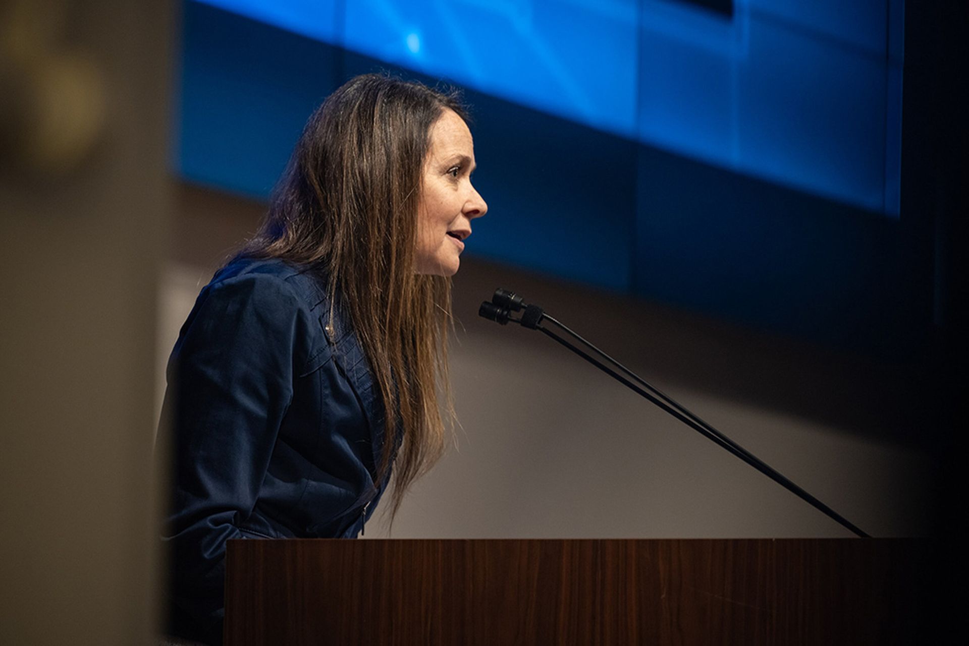 Jen Easterly speaks at a podium