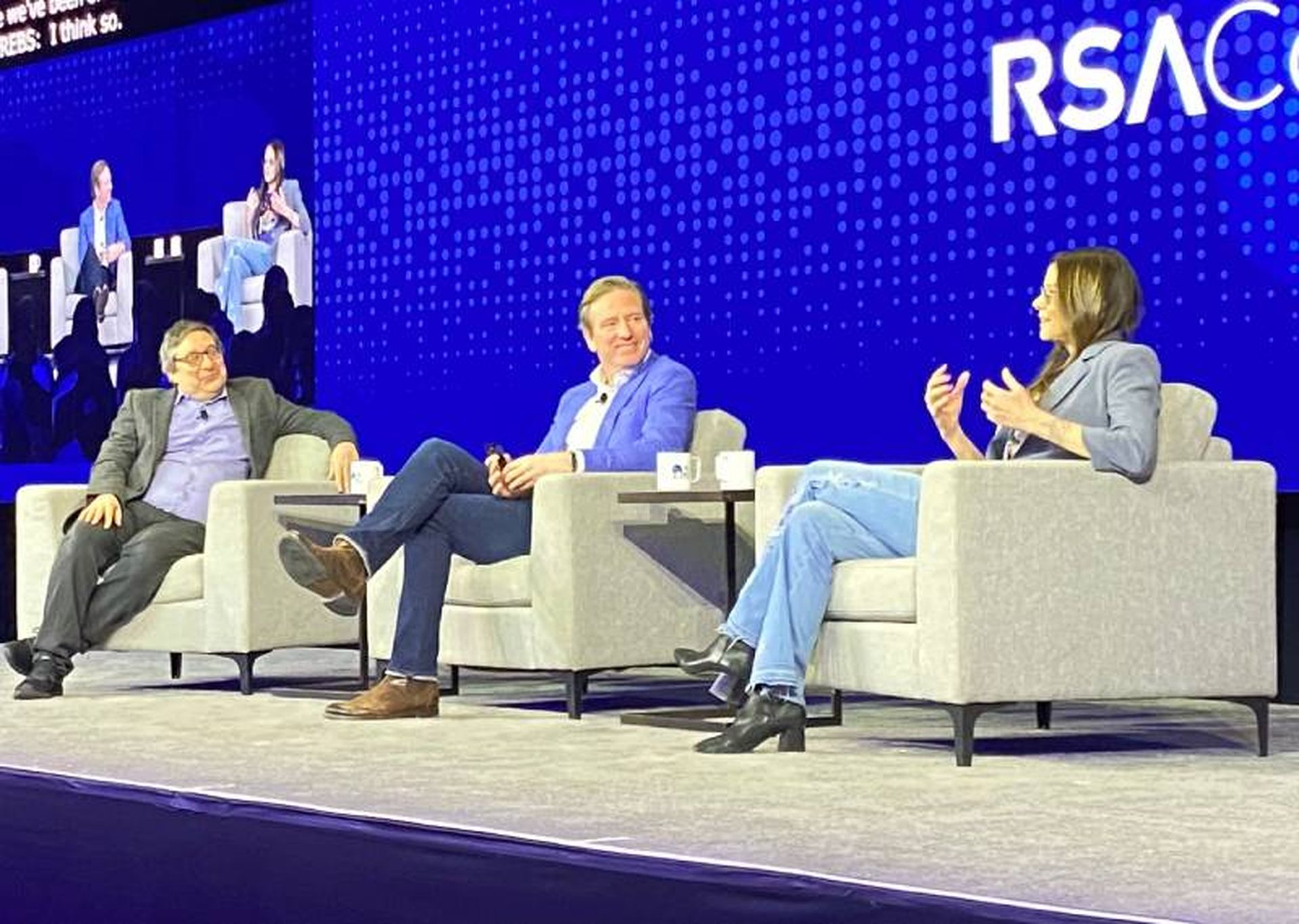 CISA Director Jen Easterly (right) and former CISA Director Chris Krebs (center) sit on an RSAC 2024 keynote panel moderated by Washington Post Digital Threats Reporter Joseph Menn (left).