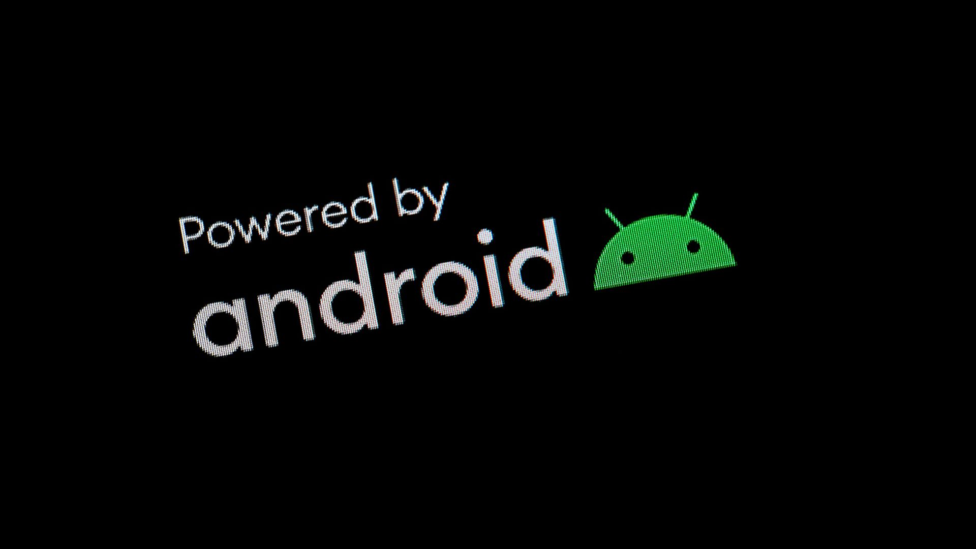 Powered by Android operating system OS software logo icon on a smartphone tablet mobile phone device display screen macro, extreme closeup detail, nobody Android apps