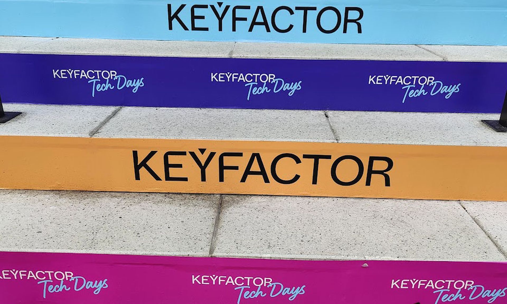 Steps in different colors reading KEYFACTOR Tech Days.