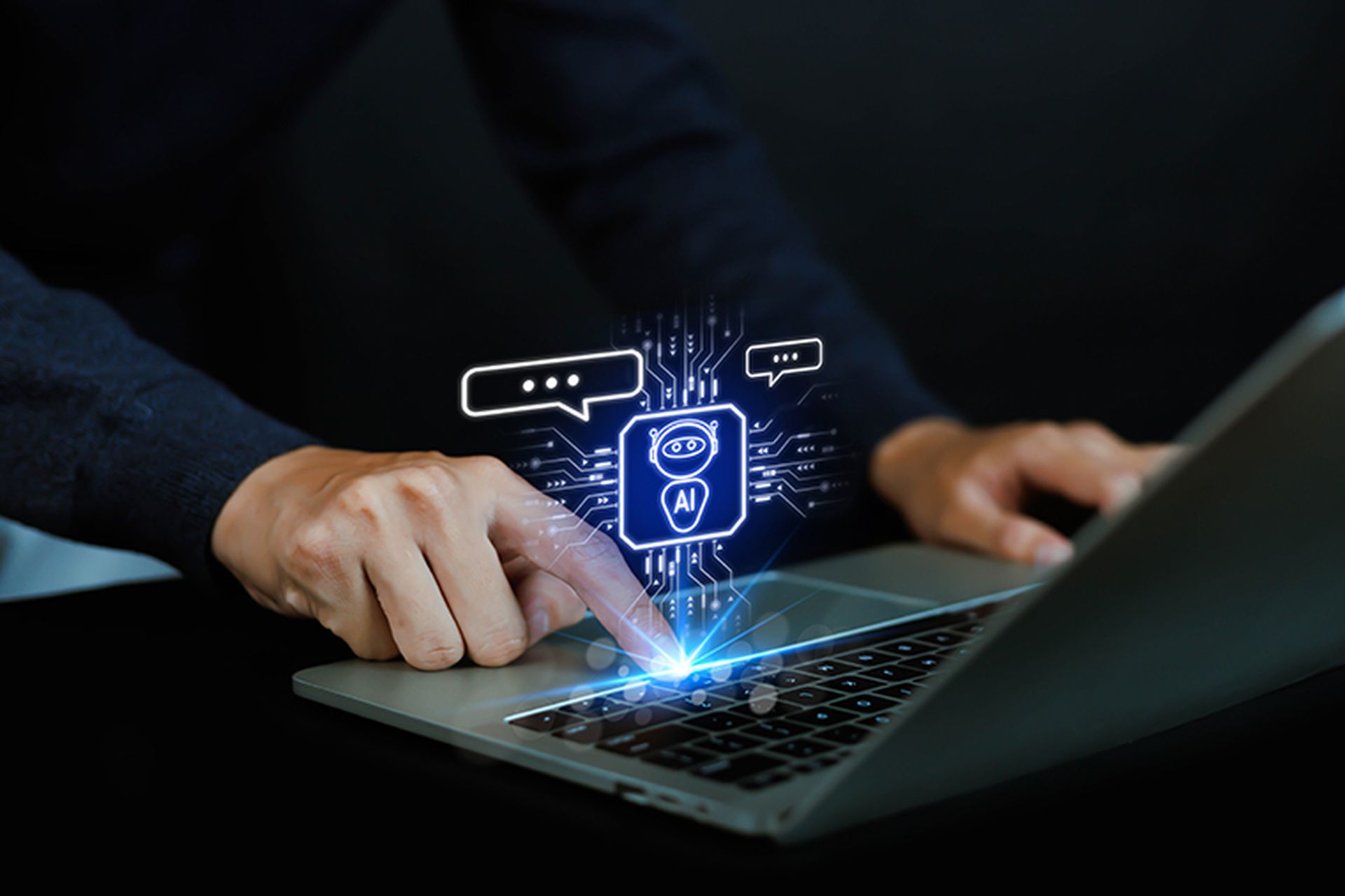 Man using laptop to chat with AI Chatbot Assistant or Artificial Intelligence Technology, Hologram Robot Application and Global Connectivity