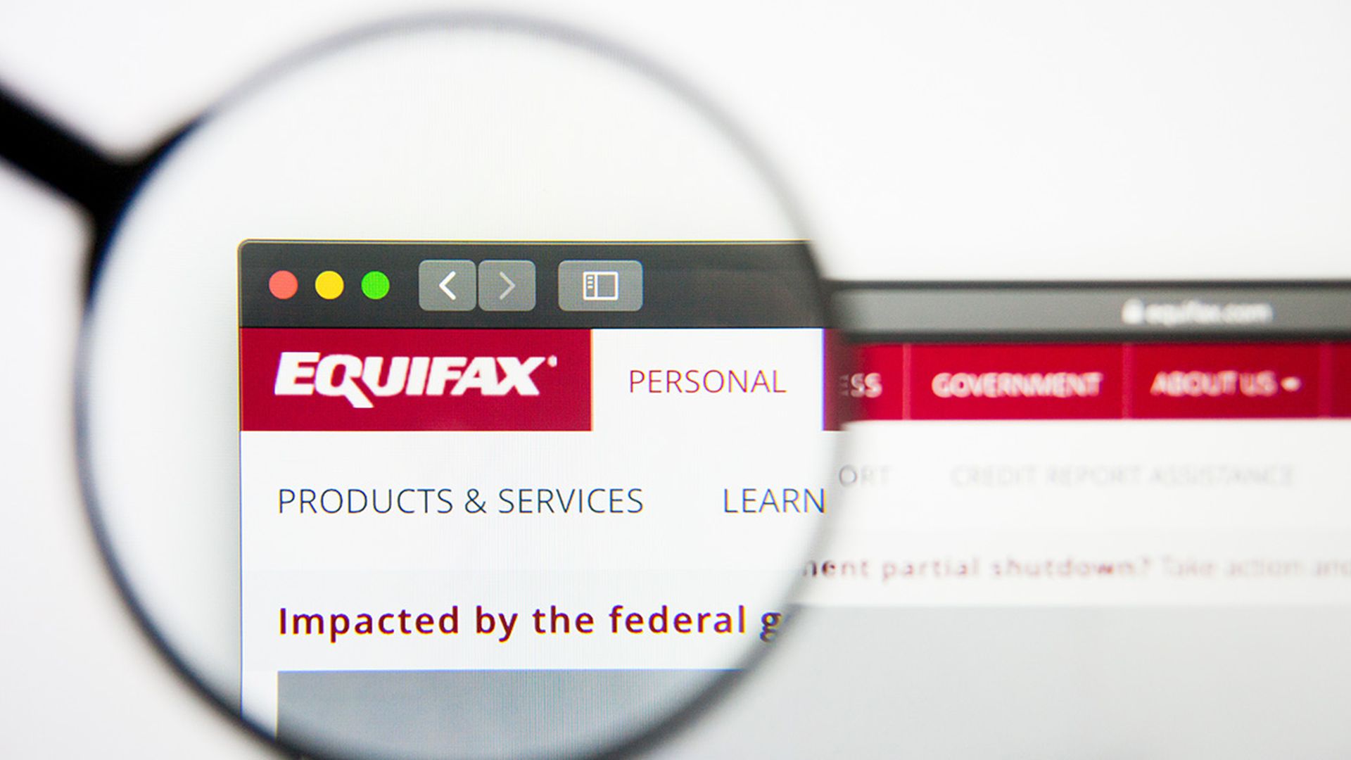 Equifax website homepage. Equifax logo visible on display screen