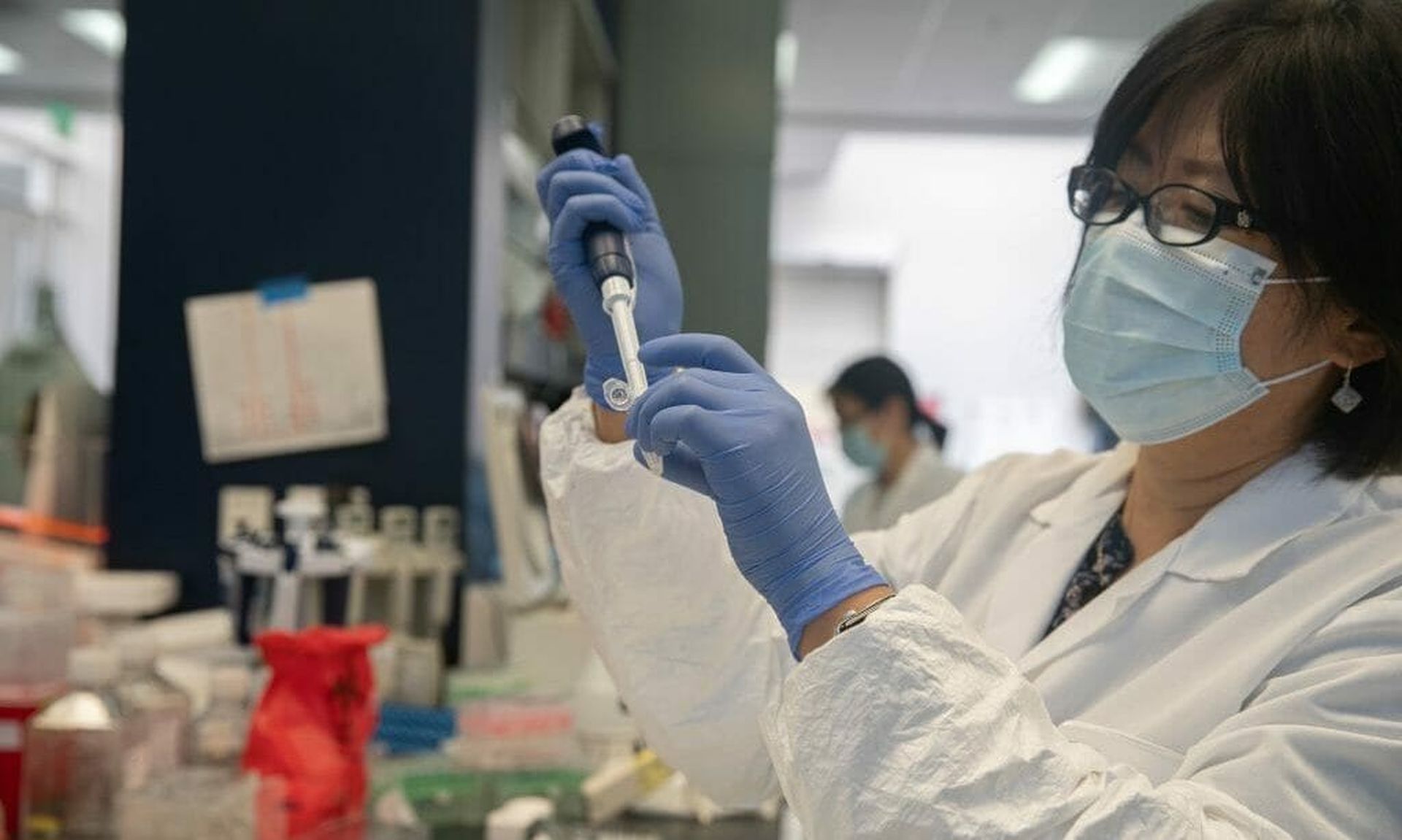 Bonghui Li works in a lab that is focused on fighting COVID-19 at Sorrento Therapeutics in San Diego on May 22, 2020. (Ariana Drehsler/AFP via Getty Images)