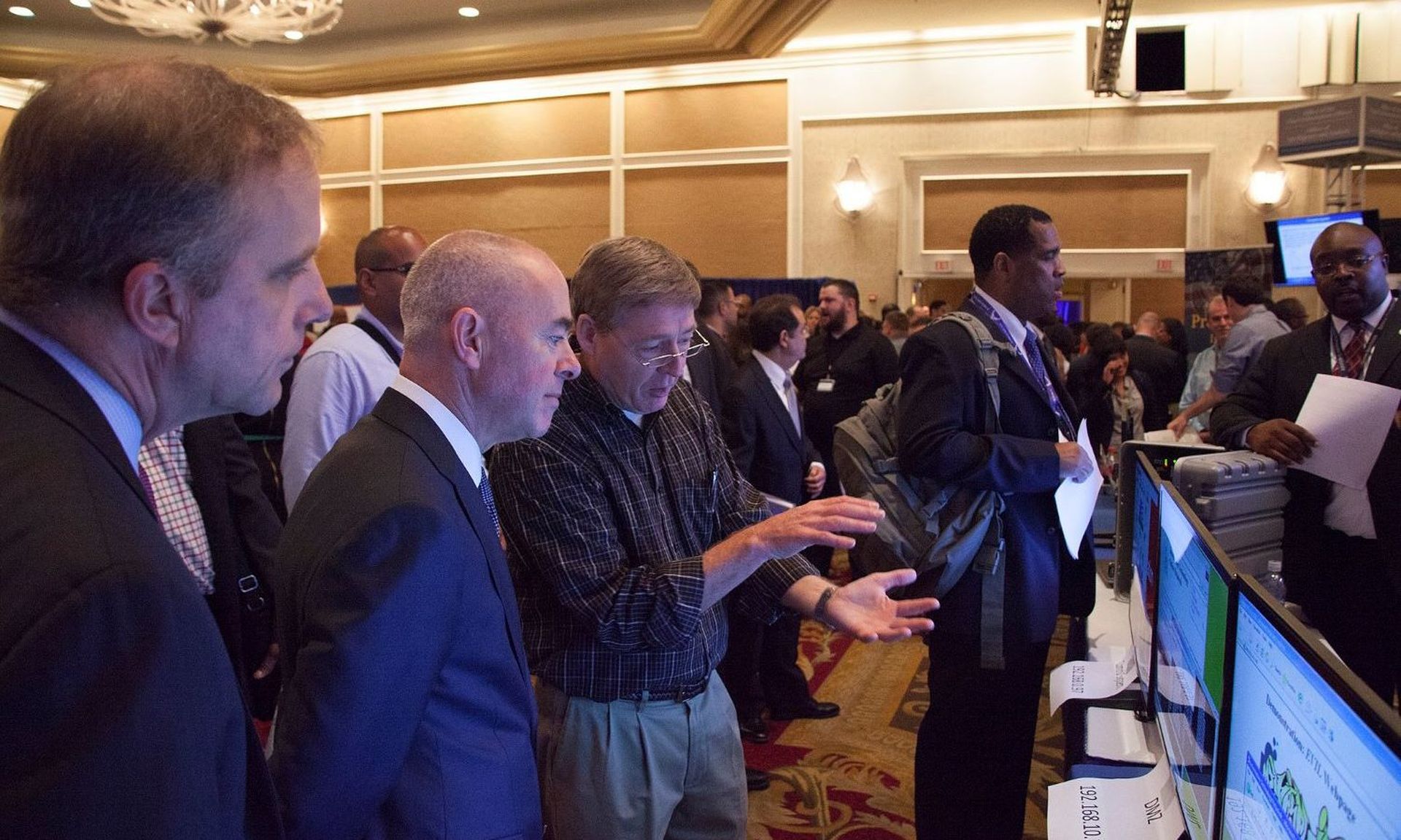 Government officials and job seekers meander a DHS Cyber and Tech Job Fair in 2016. (Ryan Henderson/DHS)
