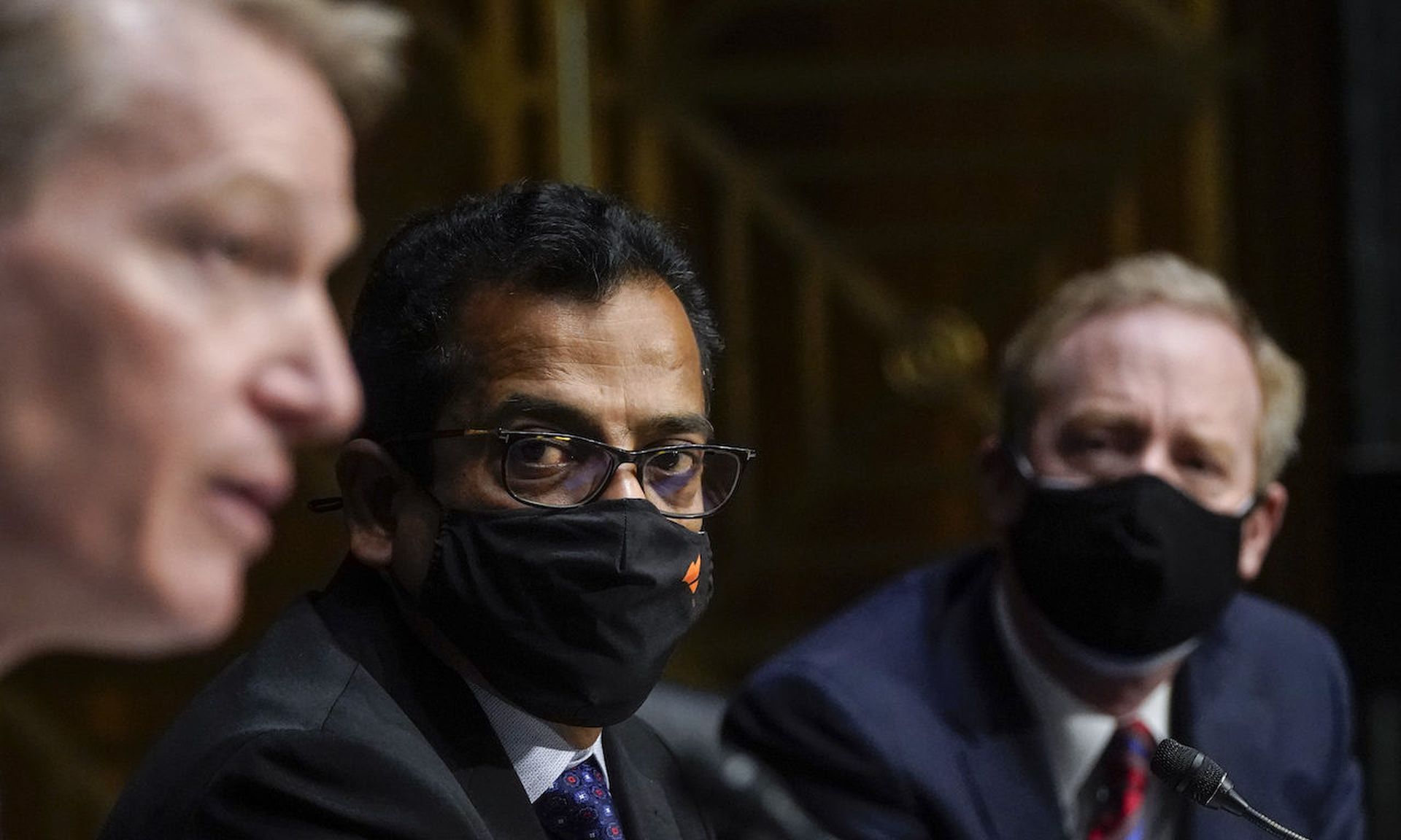 (L-R) FireEye CEO Kevin Mandia, SolarWinds CEO Sudhakar Ramakrishna and Microsoft President Brad Smith testify during a Senate Intelligence Committee hearing February 23, focusing on the 2020 cyberattack that led to a series of data breaches within government and industry. All three witnesses endorsed mandatory disclosure of breaches, with caveats....