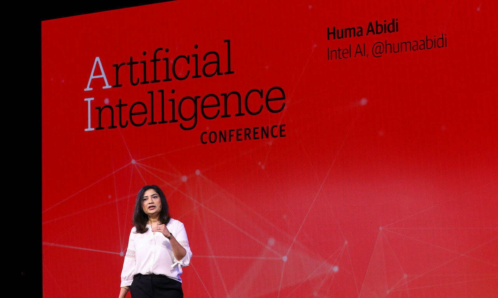 Huma Abidi of Intel speaks at the Artificial Intelligence Conference in San Francisco three years ago. Today’s columnist, Dave Anderson of Dynatrace, says AI-powered risk and impact analysis and remediation can deliver the visibility developers need to more effectively manage vulnerabilities.