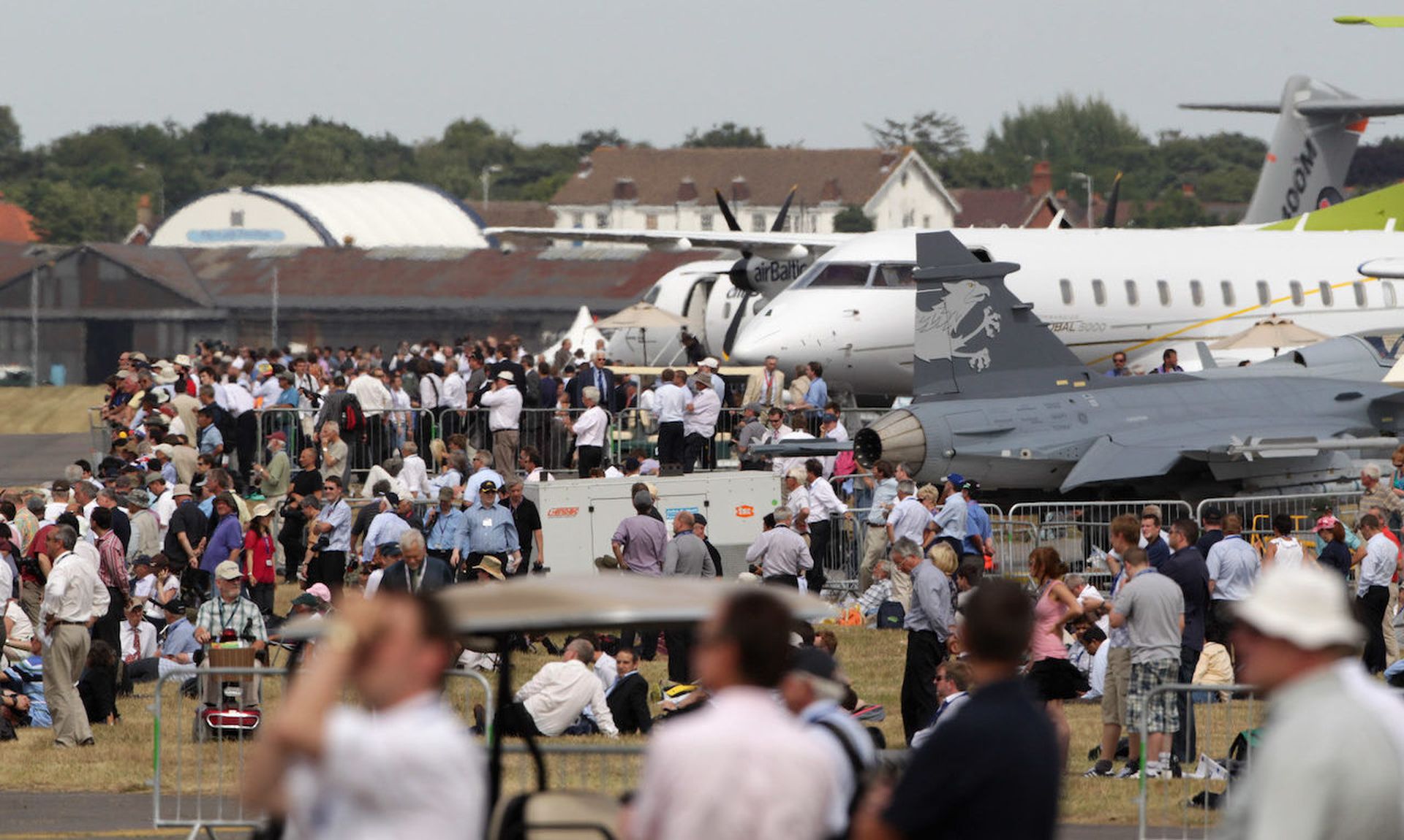 Members of the public observe military and commercial aircraft at the Farnborough Airshow on July 20, 2010 in Farnborough, England. The defense industrial base were the primary target in attacks leveraging Pulse Secure discovered in the spring. (Photo by Dan Kitwood/Getty Images)