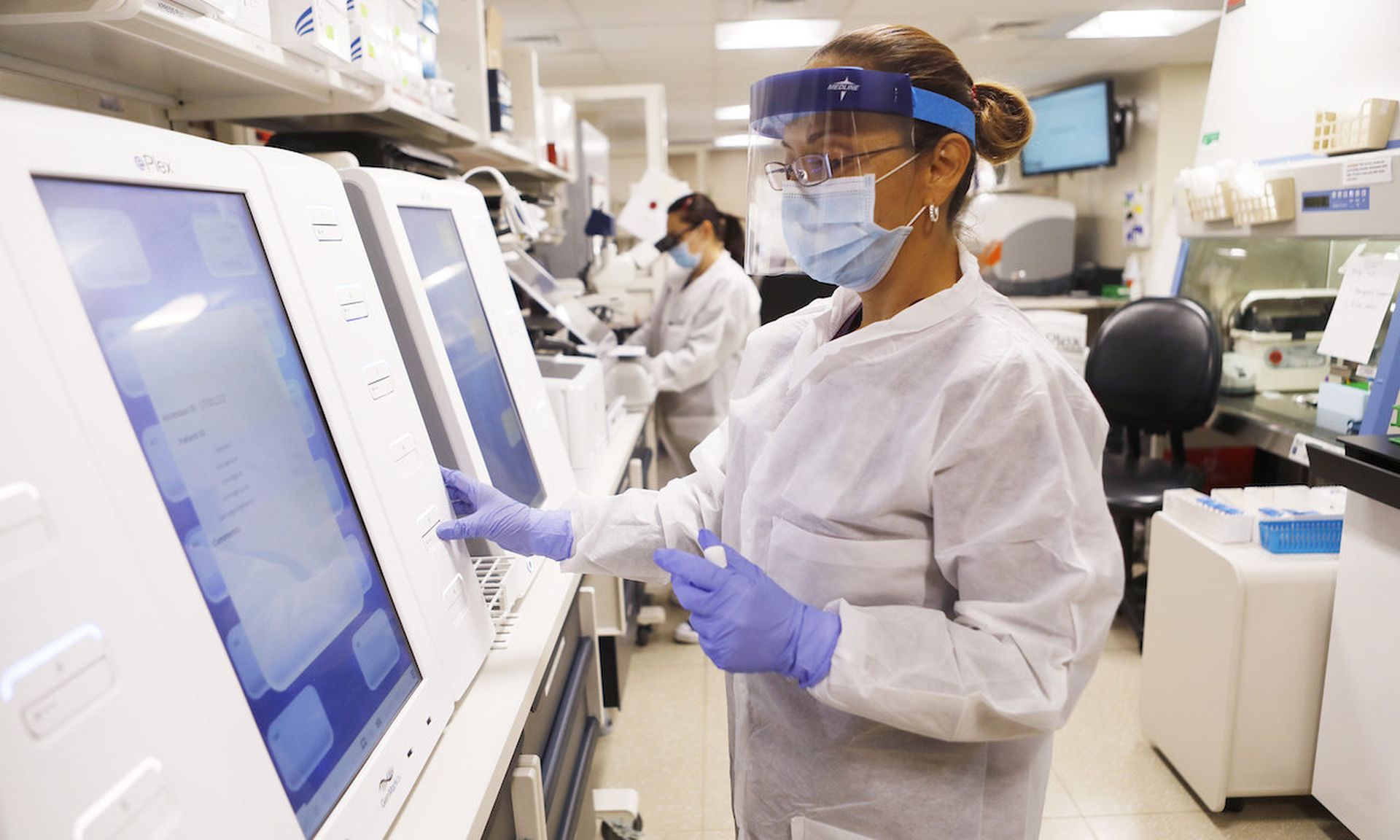 A medical technologist processes test samples for the coronavirus at the AdventHealth Tampa labs on June 25, 2020, in Tampa, Fla. (Octavio Jones/Getty Images)