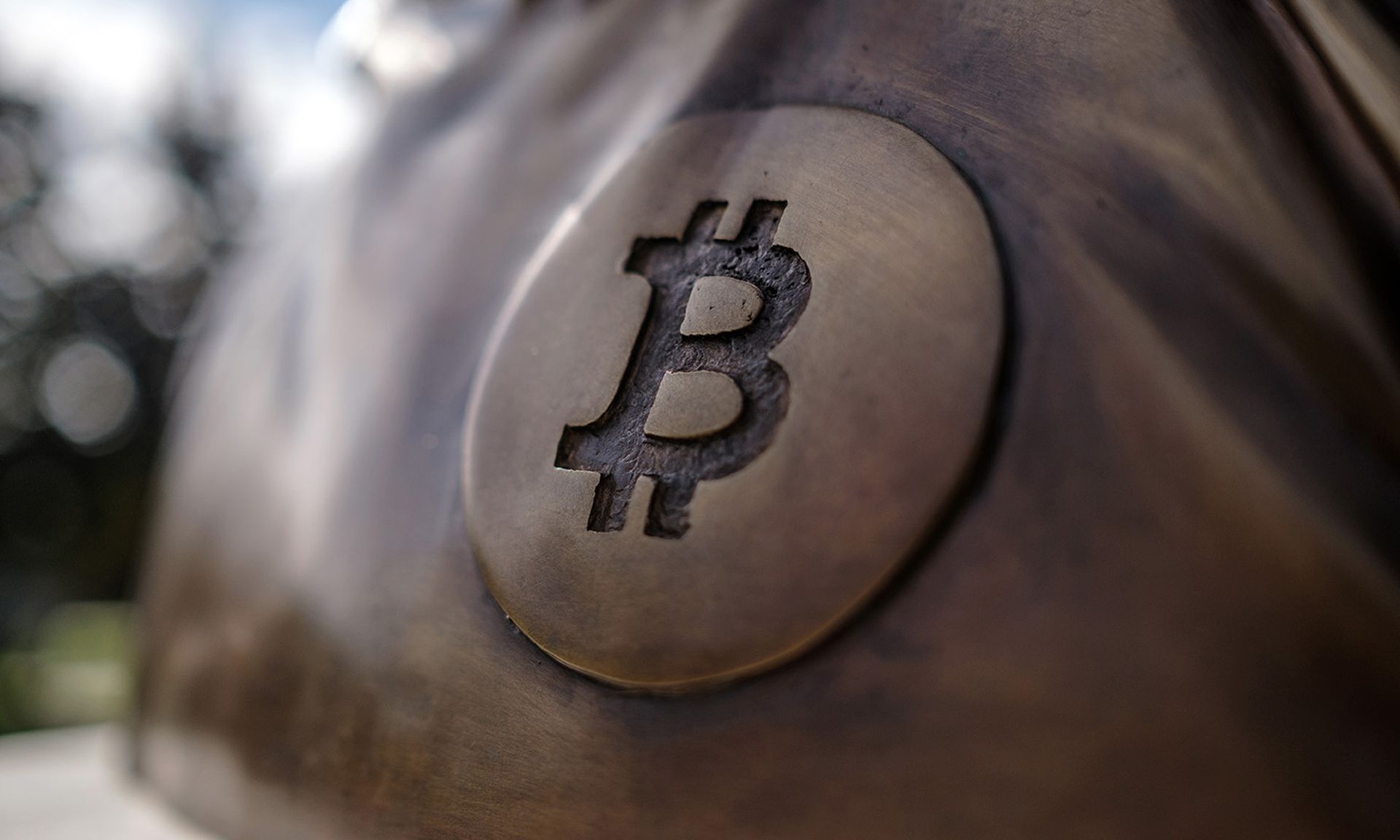 A detail of the statue of Satoshi Nakamoto, a presumed pseudonym used by the inventor of Bitcoin, is displayed in Graphisoft Park on Sept. 22, 2021, in Budapest, Hungary. The U.S. Treasury Department issued guidance to promote sanctions compliance in the virtual currency industry aimed at curbing ransomware. (Photo by Janos Kummer/Getty Images)