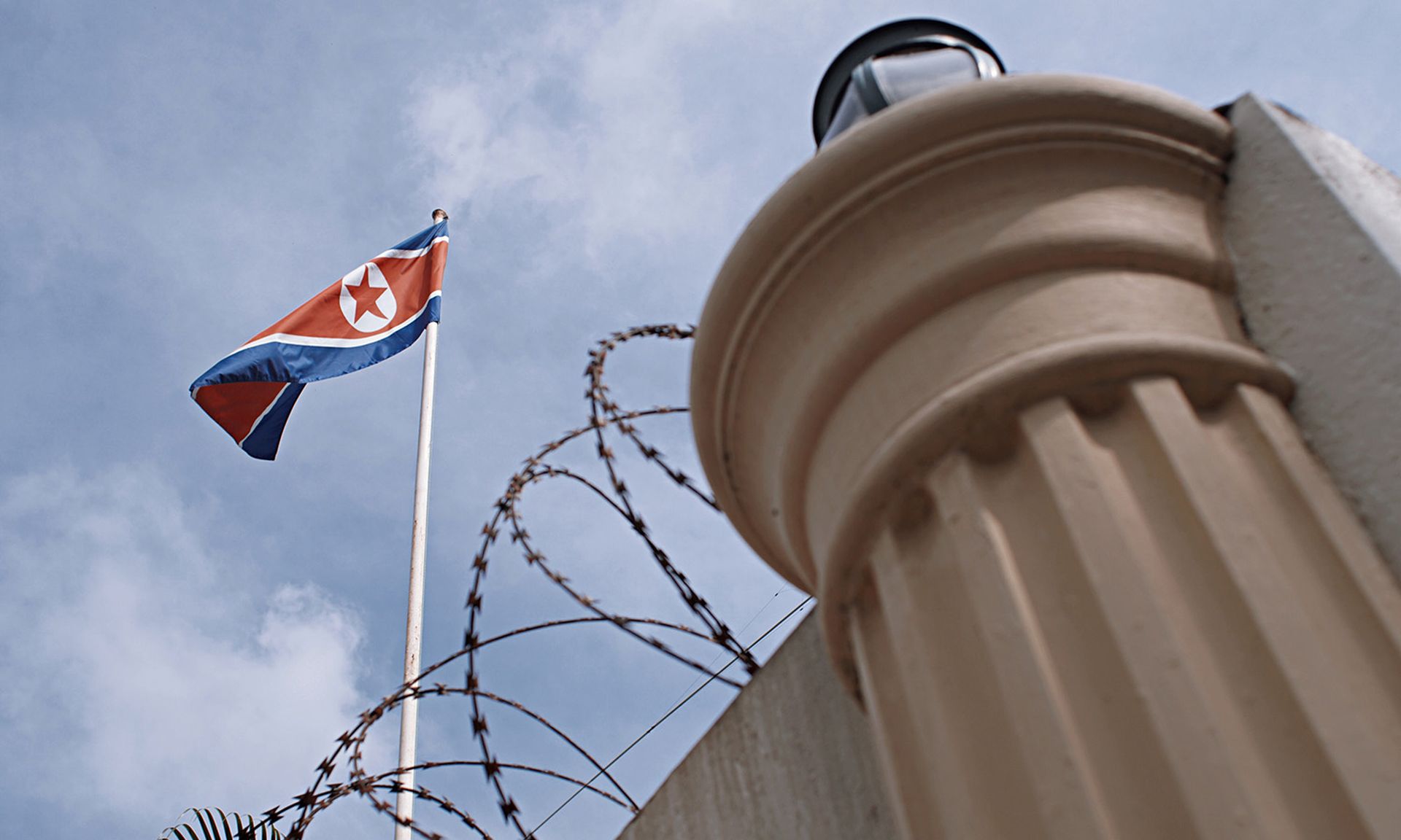 A North Korean flag is seen at the North Korean Embassy compound on Feb. 22, 2017, in Kuala Lumpur, Malaysia. (Photo by Rahman Roslan/Getty Images)