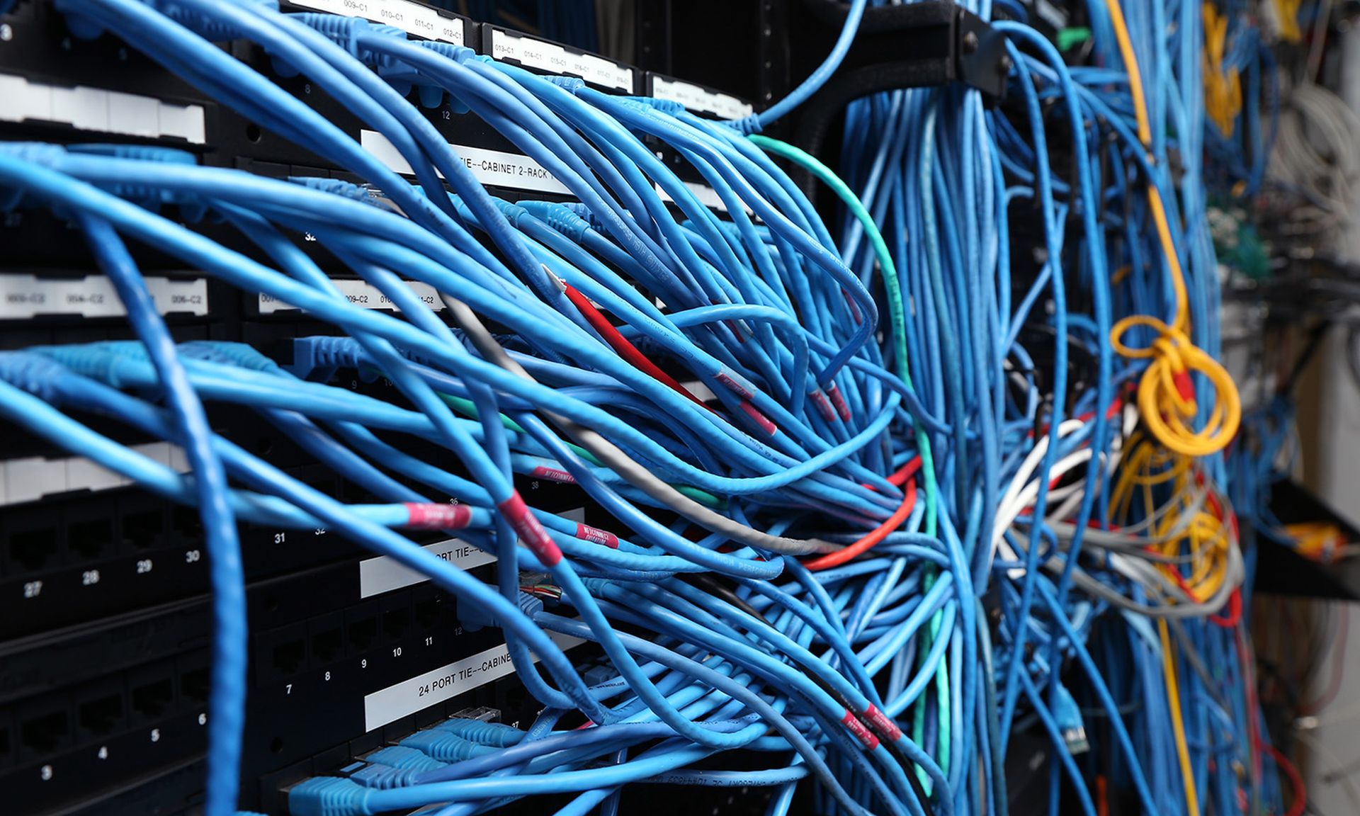 Network cables are plugged in a server room on Nov. 10, 2014, in New York City. (Photo by Michael Bocchieri/Getty Images)