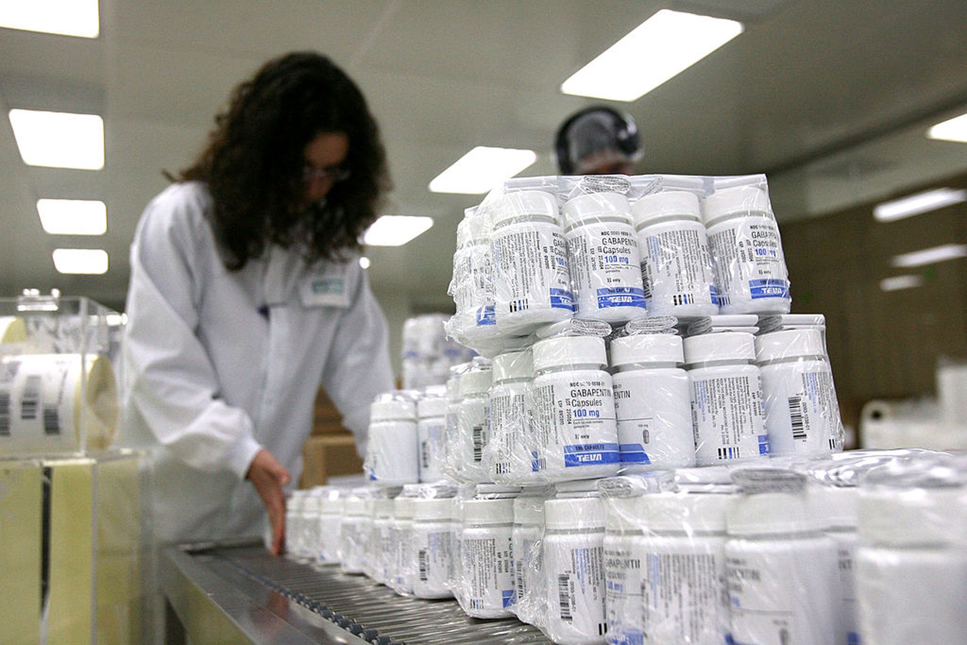 Teva Pharmaceuticals workers pack drugs in a clean room at the company&#8217;s manufacturing plant March 10, 2008, in Jerusalem. Teva is regarded as the world&#8217;s largest generic drug maker. (Photo by Uriel Sinai/Getty Images)