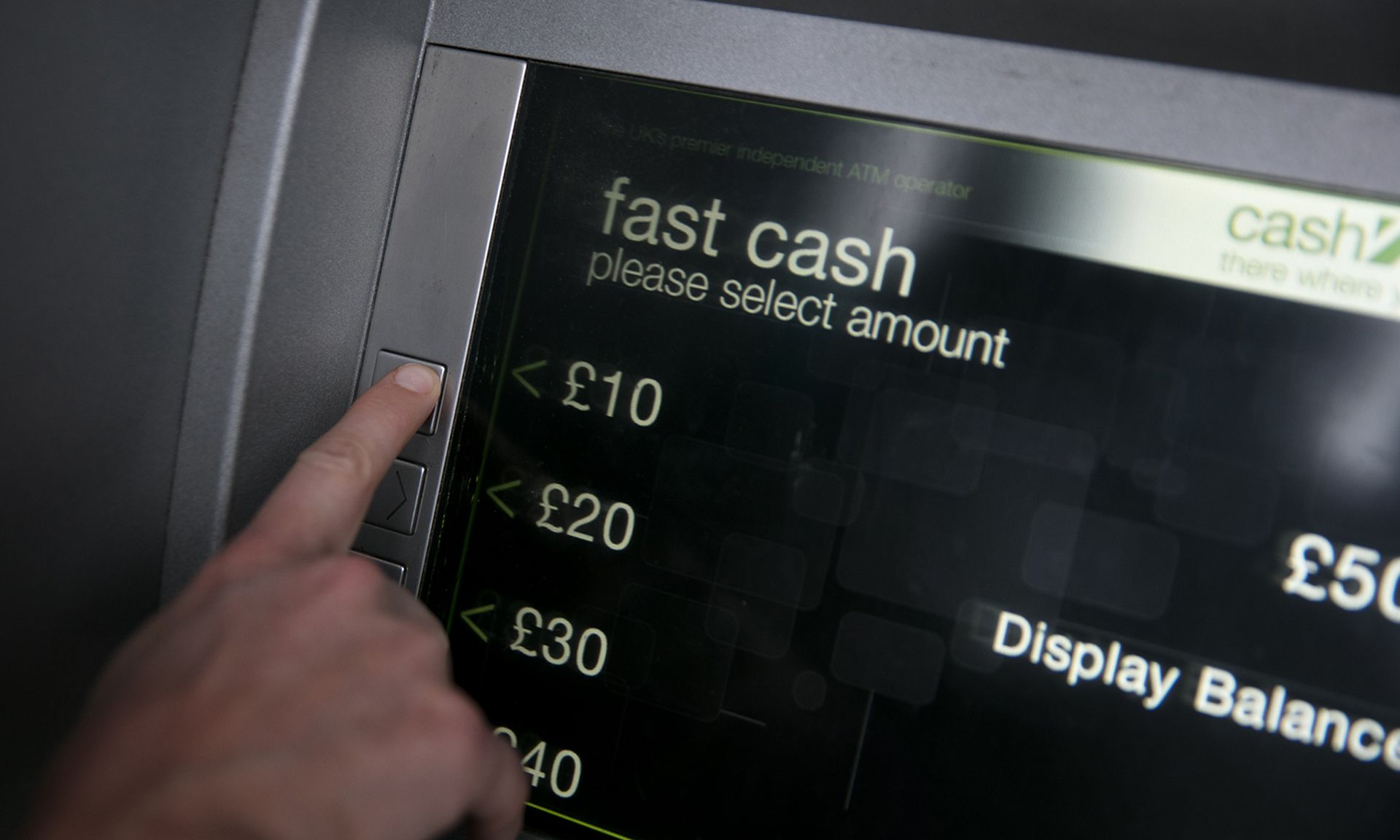 A botnet dubbed &#8220;SharkBot&#8221; is targeting mobile banking customers are being targeted in Europe. Pictured: A woman uses a cashpoint ATM on Nov. 3, 2017, in Bristol, England. (Photo by Matt Cardy/Getty Images)