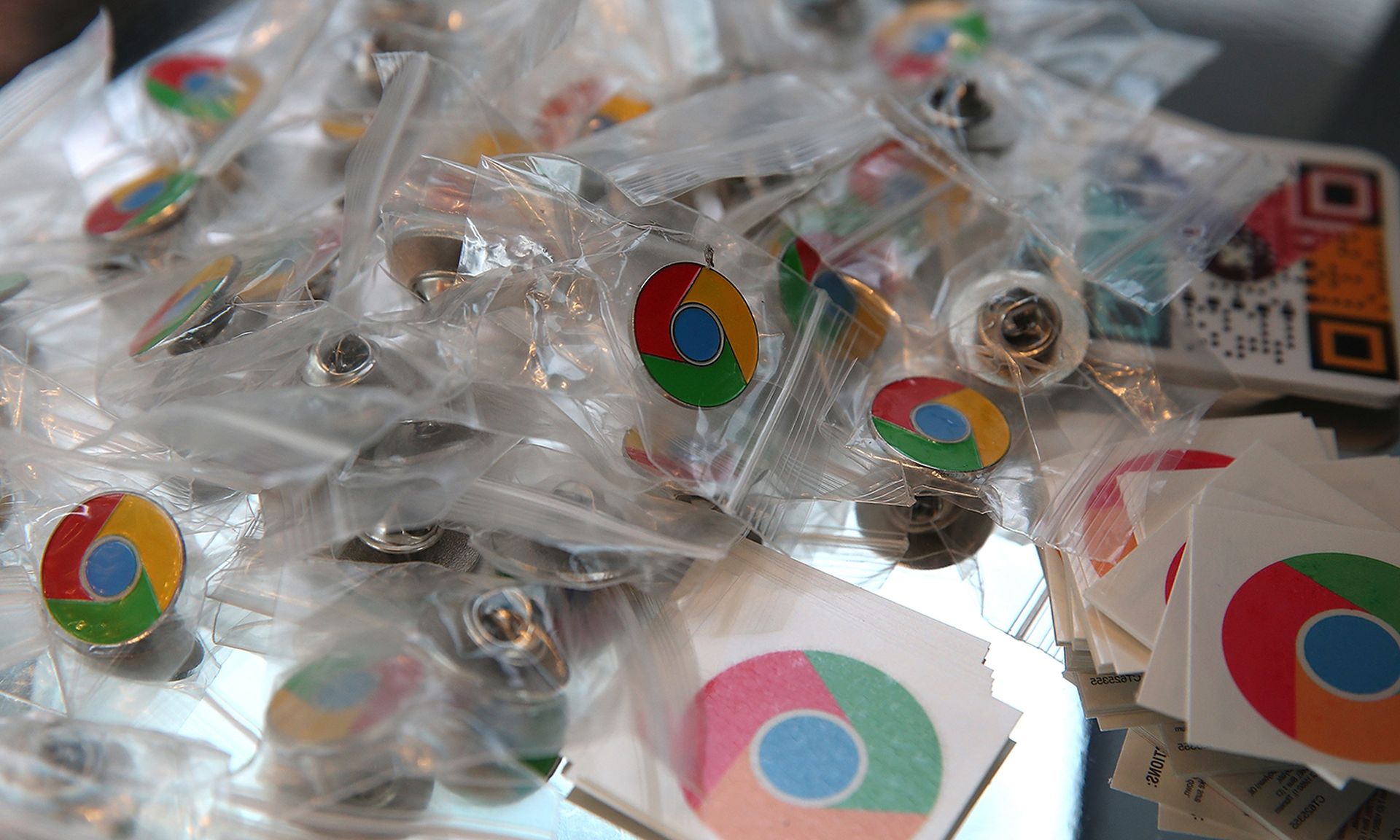 Google Chrome pins and stickers are displayed during the Google I/O developers conference at the Moscone Center on May 15, 2013, in San Francisco. (Photo by Justin Sullivan/Getty Images)