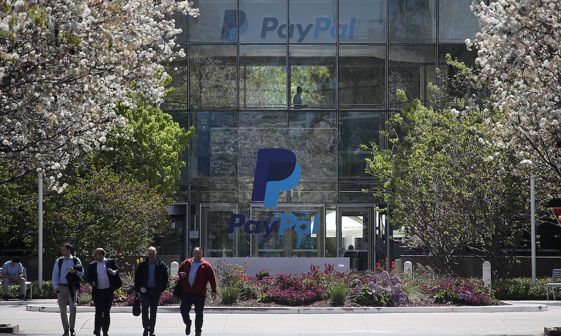 A sign is posted outside of the PayPal headquarters on April 9, 2018, in San Jose, Calif. (Photo by Justin Sullivan/Getty Images)