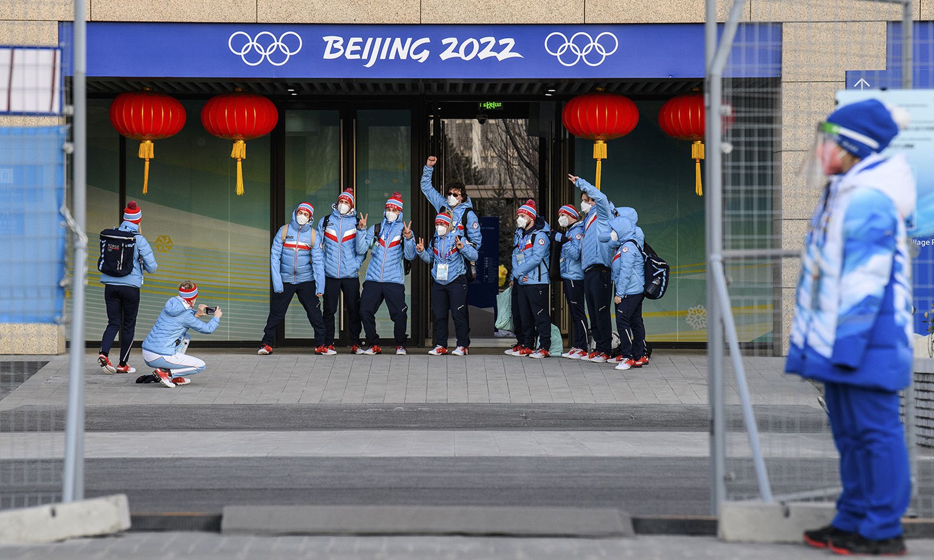 Members of Team Norway pose for a photo after passing through the gate for the Olympic Village ahead of the Beijing 2022 Winter Olympic Games on Feb. 1, 2022 in Beijing, China. (Photo by Anthony Wallace/Pool via Getty Images)