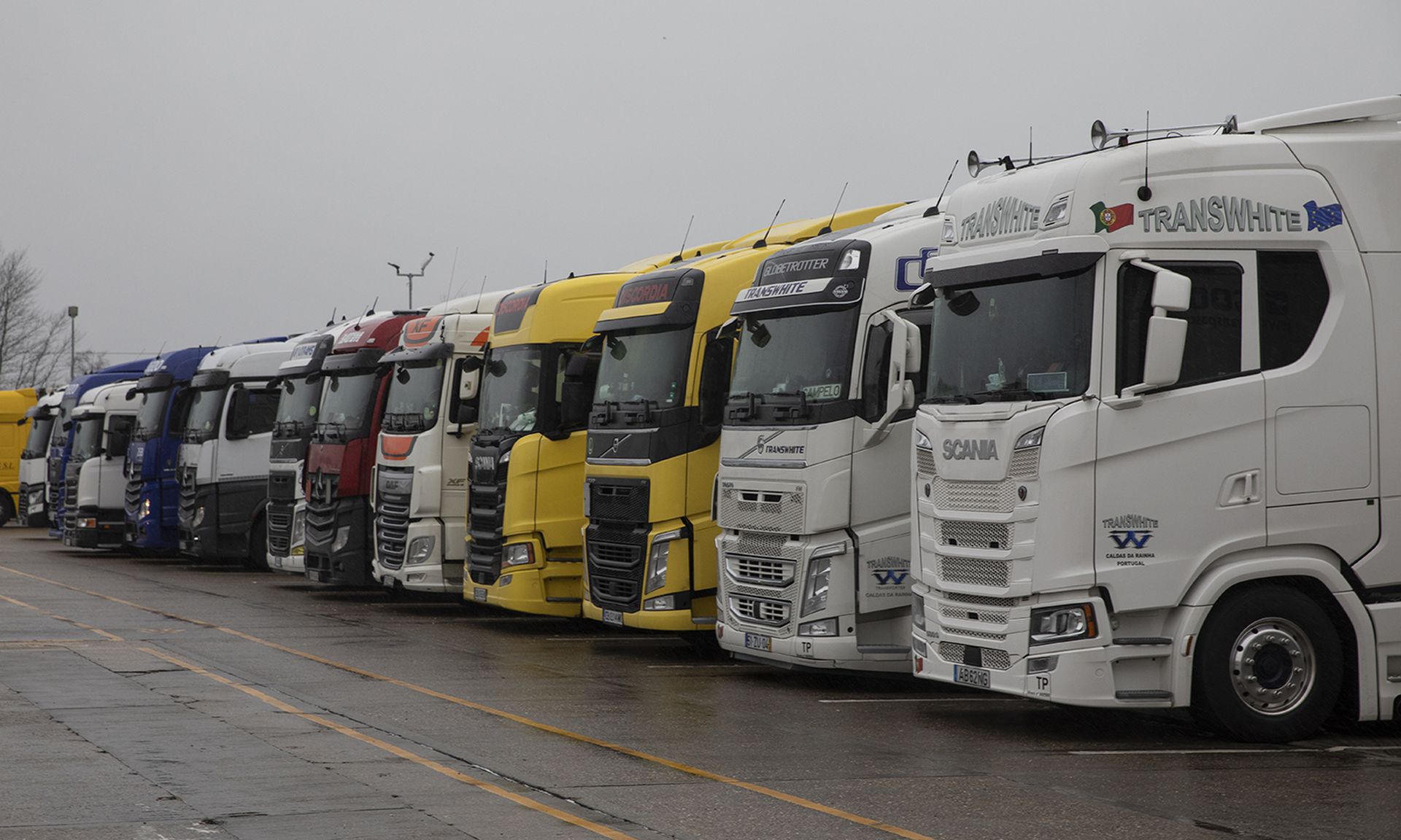 A threat group Proofpoint researchers call &#8220;TA2541&#8221; has used emails surrounding the pandemic to lure victims in critical industries. Pictured: Lorries heading to Europe park in a service station as they wait for travel restrictions to be lifted on Dec. 21, 2020, in Dover, England. (Photo by Dan Kitwood/Getty Images)