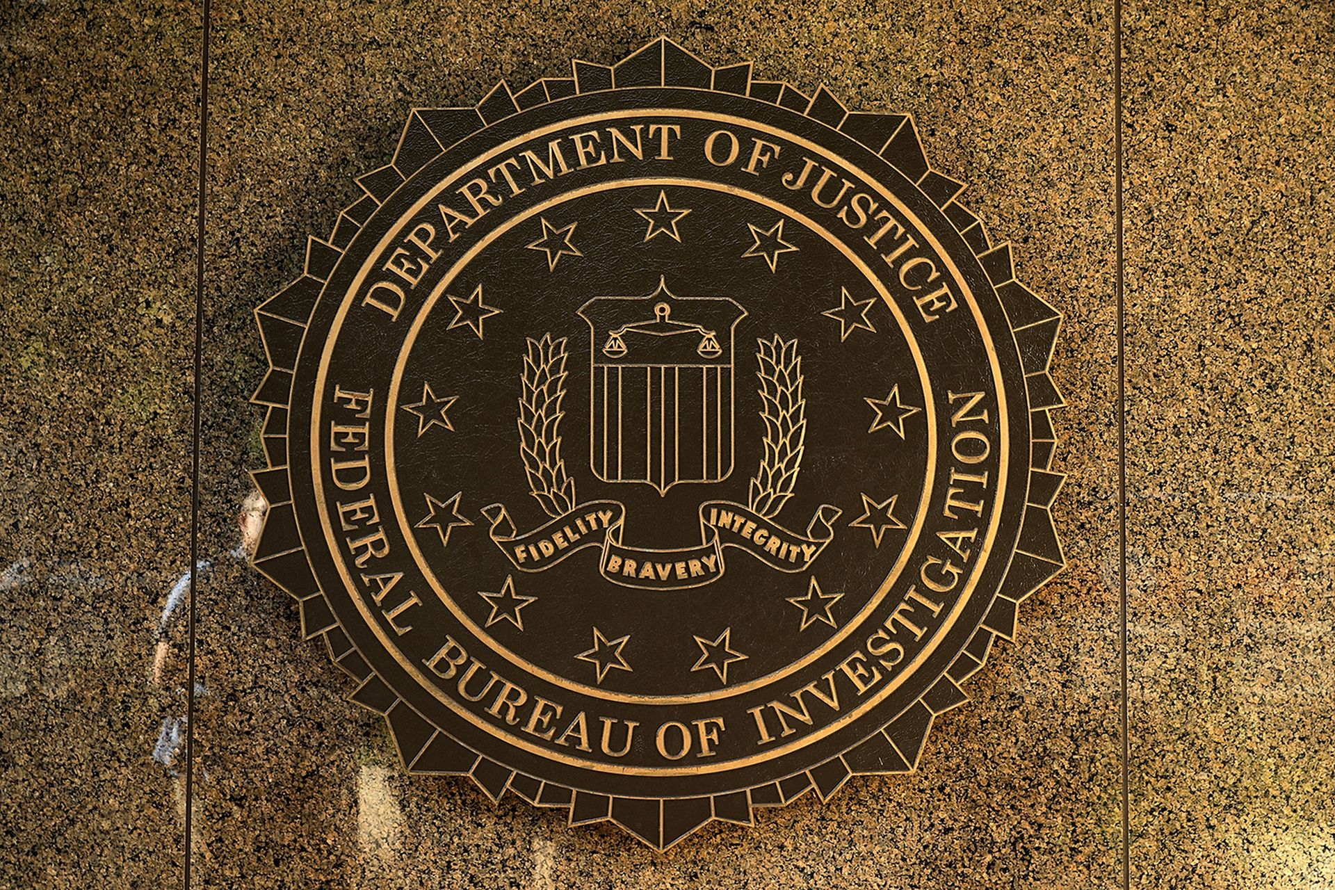 The seal of the Federal Bureau of Investigation hangs on the outside of the bureau&#8217;s Edgar J. Hoover Building May 9, 2017, in Washington.  (Photo by Chip Somodevilla/Getty Images)