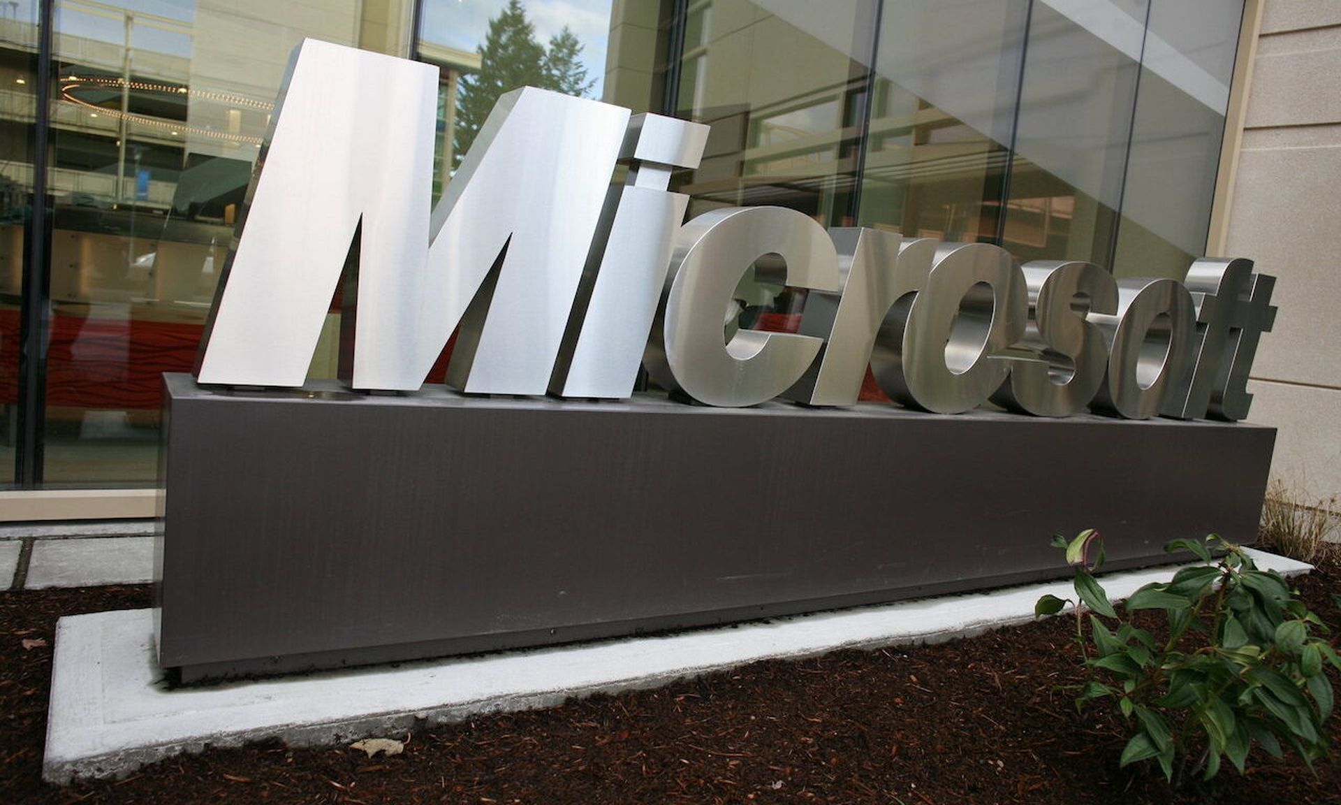 (&#8220;Microsoft sign outside building 99&#8221; by Robert Scoble is marked with CC BY 2.0.)