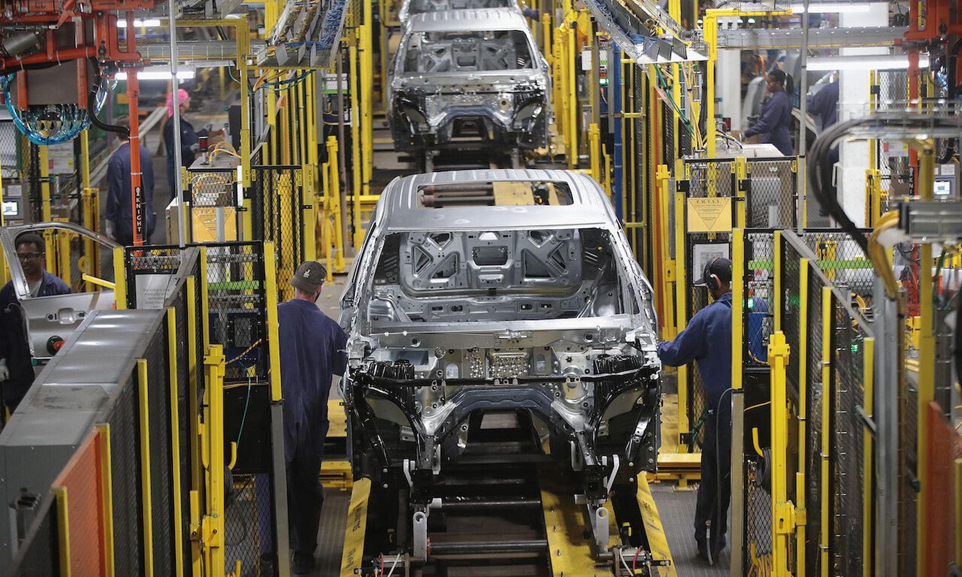 Workers assemble Ford vehicles at the Chicago Assembly Plant on June 24, 2019 in Chicago, Illinois. Ford recently invested $1 billion to upgrade the facility where they build the Ford Explorer, Police Interceptor Utility and the Lincoln Aviator.  (Photo by Scott Olson/Getty Images)