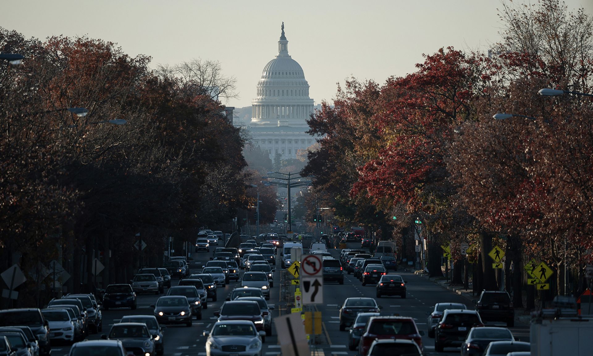 The U.S. Capitol dome is seen as traffic fills North Capitol Street on Nov. 23, 2021, in Washington. (Photo by Anna Moneymaker/Getty Images)