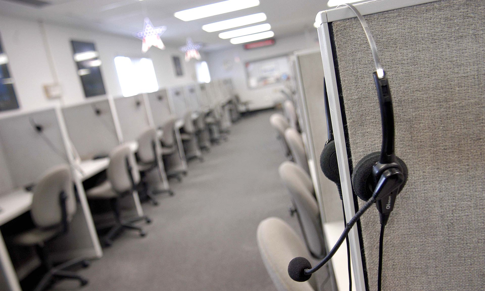 A headset hangs on a cubical wall on Sept. 26, 2003, in Philadelphia. (Photo by William Thomas Cain/Getty Images)