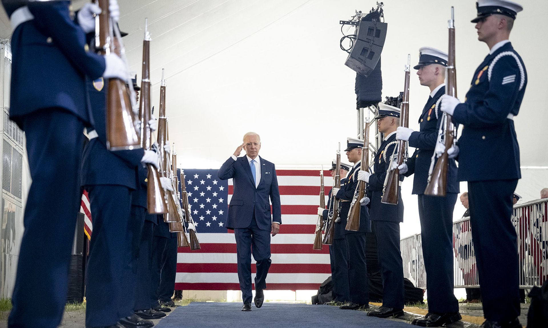 Pictured: President Joe Biden salutes during a U.S. Coast Guard change-of-command ceremony in Washington. (Benjamin Applebaum/DHS)