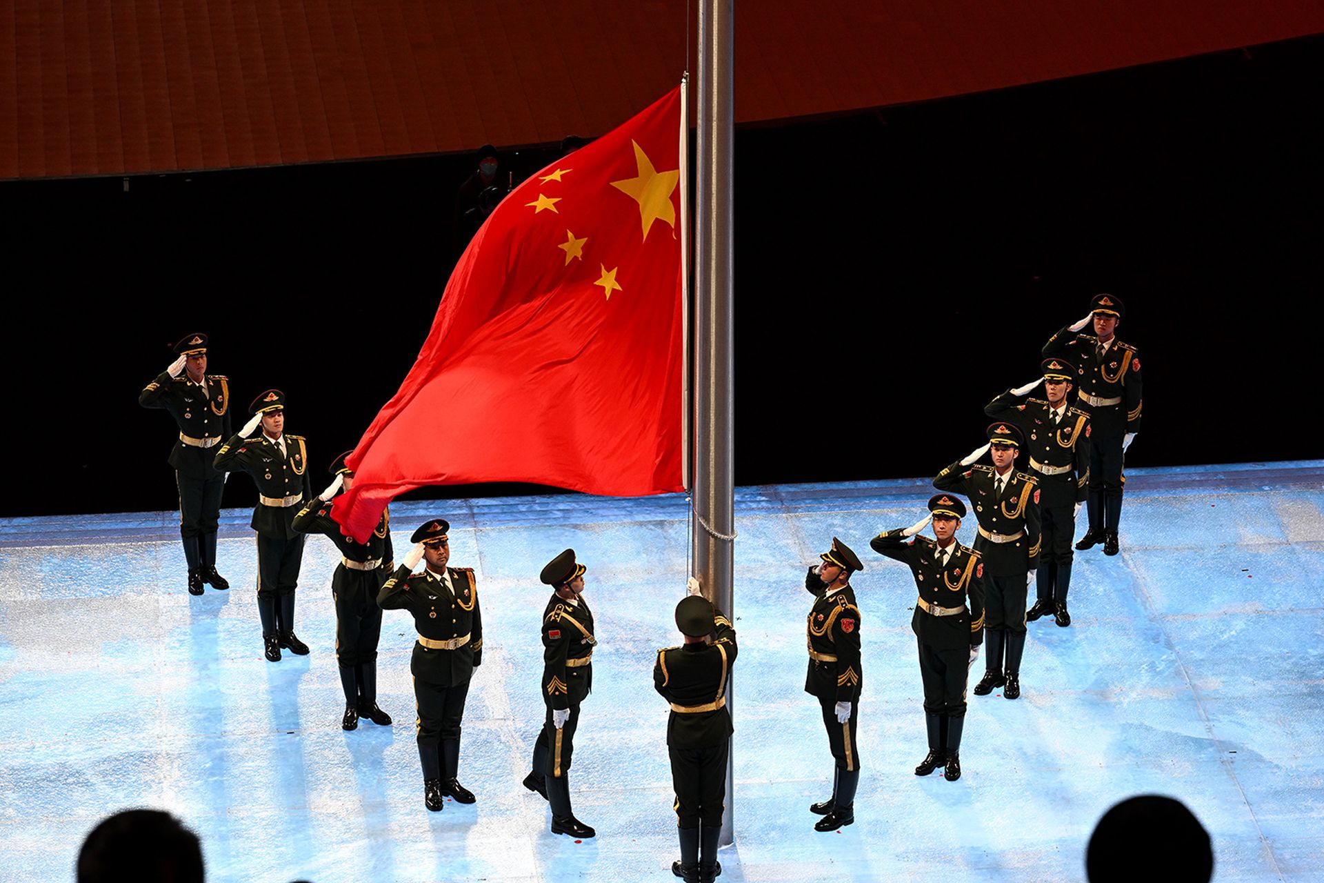 Mandiant researchers announced a Chinese-aligned operation called Dragonbridge that targeted rare earth mineral firms in the U.S., Australia and Canada. Pictured: The Chinese flag is raised inside the stadium during the closing ceremony of the 2022 Beijing Winter Paralympics on March 13, 2022, in Beijing. (Photo by Zhe Ji/Getty Images for Internati...