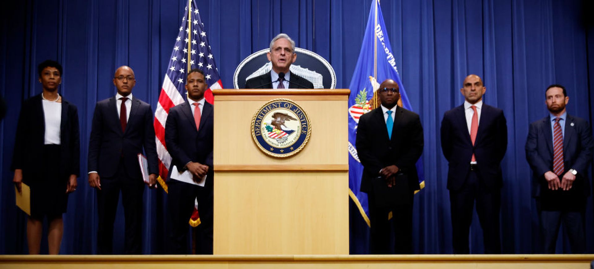 U.S. Attorney General Merrick Garland, center, announces a resolution of a foreign-bribery investigation during a news conference. The past year has brought a number of court-imposed and policy changes to the nation’s premier hacking law, the Computer Fraud and Abuse Act (CFAA). (Photo by Chip Somodevilla/Getty Images)
