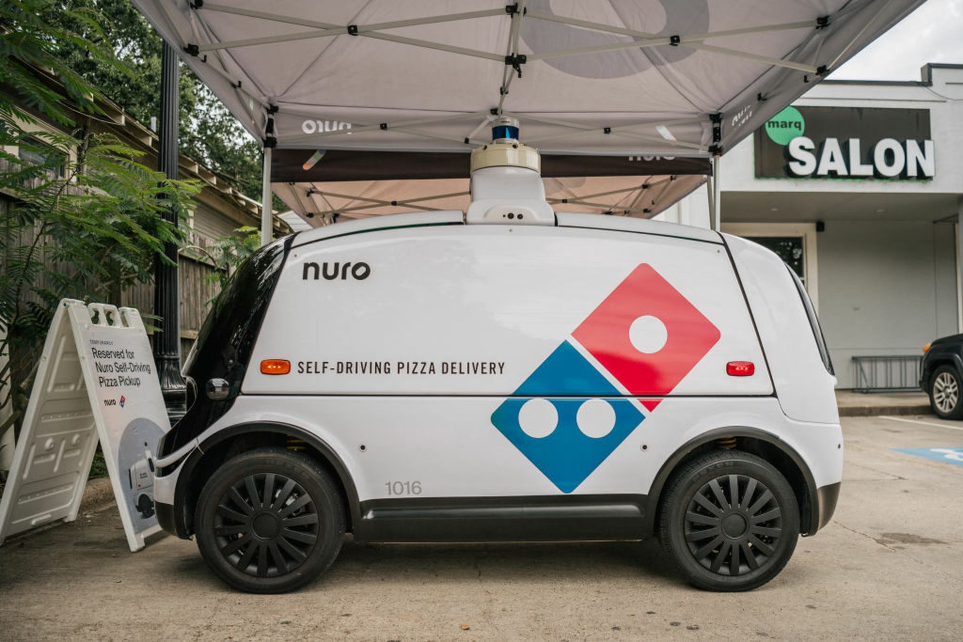 A Domino&#8217;s Pizza self-driving delivery vehicle is shown on July 22, 2021, in Houston. A trade group representing producers of unmanned drones, cars, airplanes, boats and other vehicles is teaming up with a cybersecurity company to develop voluntary security standards for the autonomous vehicles market. (Photo by Brandon Bell/Getty Images)
