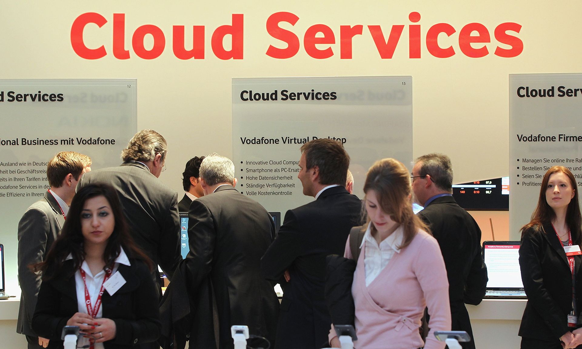 Visitors crowd the cloud computing services presentation at the Vodafone stand at the CeBIT technology trade fair on March 2, 2011, in Hanover, Germany. (Photo by Sean Gallup/Getty Images)