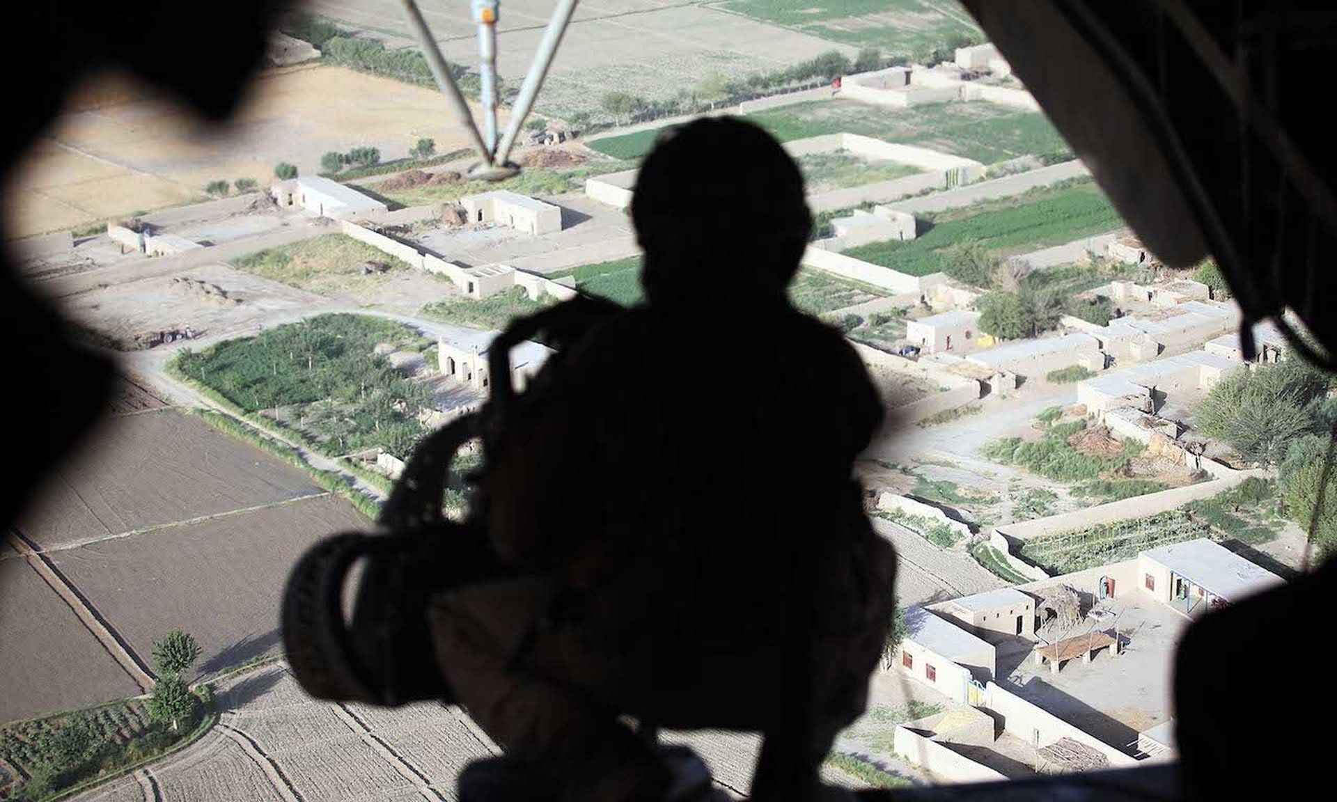 The rear gunner on a U.S. Marine helicopter keeps watch as they fly Marines from 2nd Marine Expeditionary Brigade, RCT 2nd Battalion 8th Marines Echo Co. to their location during the start of Operation Khanjari on July 2, 2009 in Afghanistan. Today’s columnist, Tom Gorup of Alert Logic fought in Afghanistan and says while there’s more time to react...