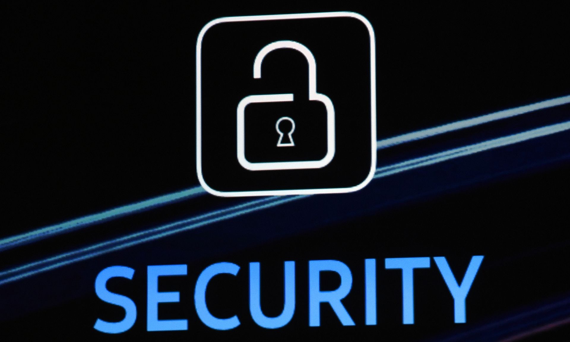 A security logo is shown on screen during a keynote address. (Photo by Ethan Miller/Getty Images)