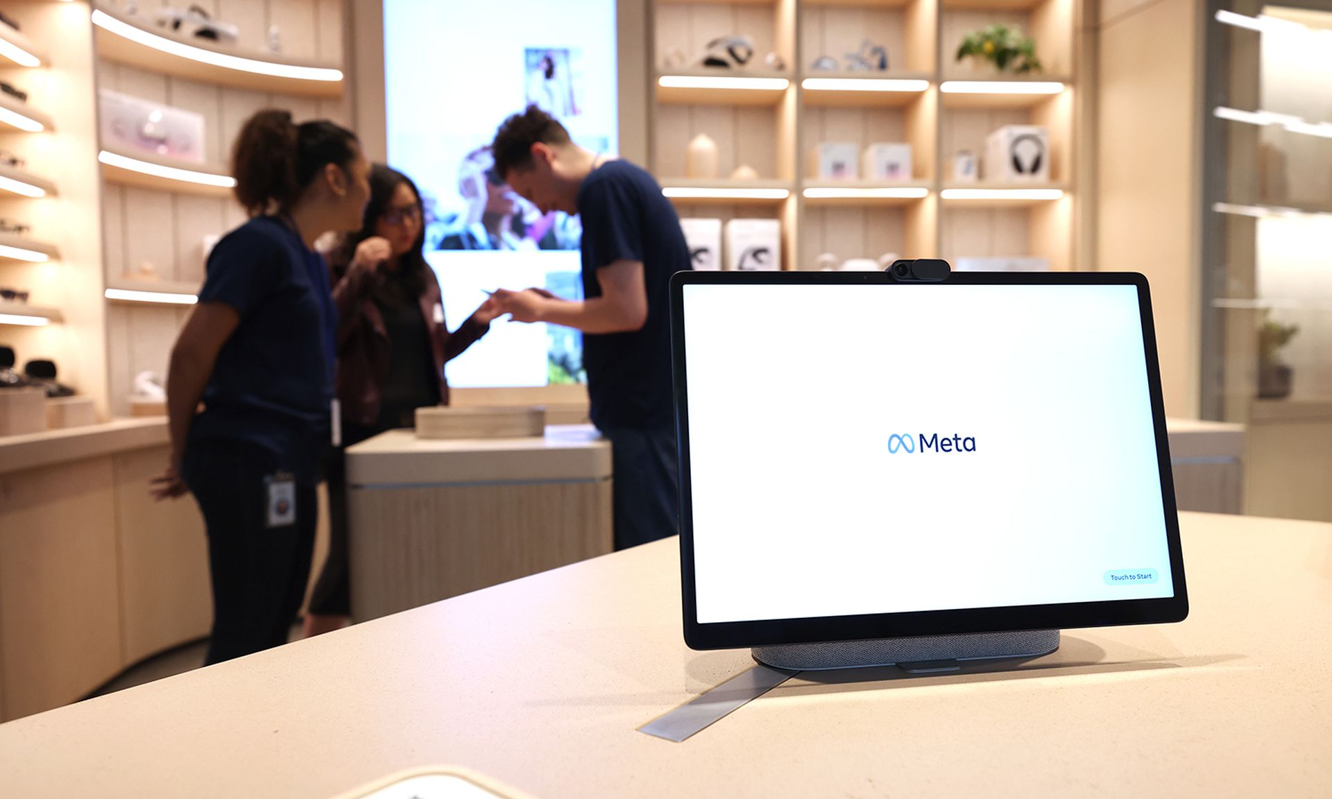 The Meta logo is displayed on a screen during a media preview of the new Meta Store