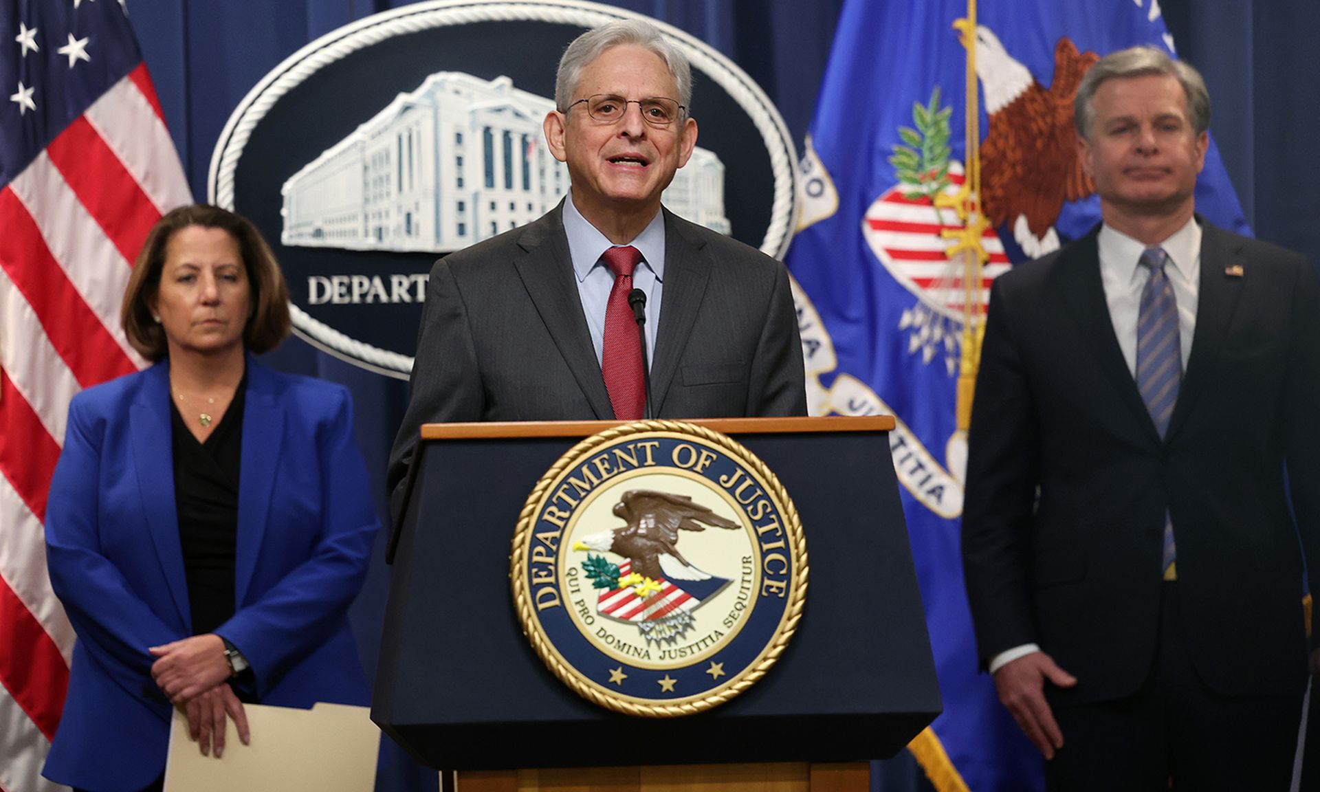 WASHINGTON, DC &#8211; JANUARY 26: U.S. Attorney General Merrick Garland (C), joined by Assistant Attorney General Lisa Monaco and Director of the Federal Bureau of Investigation (FBI) Christopher Wray, delivers remarks on an international ransomware enforcement action at the U.S. Justice Department on January 26, 2023 in Washington, DC. The Justic...