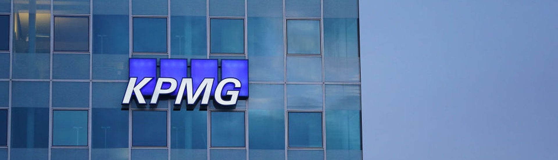 BERLIN, GERMANY &#8211; JANUARY 22: The logo of KPMG, a multinational tax advisory and accounting services company, hangs on the facade of a KPMG offices building on January 22, 2021 in Berlin, Germany. KPMG has come under the spotlight in Germany due to the company&#8217;s role in the current Wirecard scandal.  (Photo by Sean Gallup/Getty Images)
...