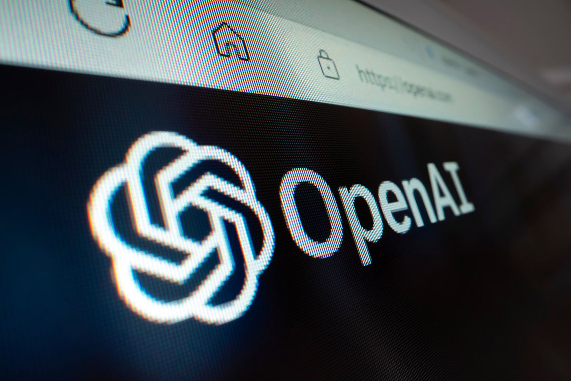 A close-up view of OpenAI logo on its website.