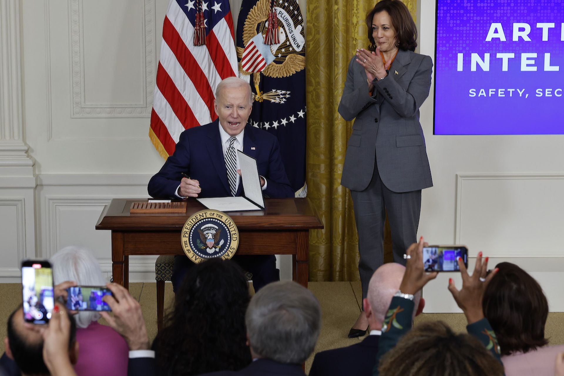 Vice President Kamala Harris looks on as President Biden signs a new executive order on artificial intelligence at the White House on October 30. Today’s columnist, Rick Holland of Reliaquest, offers three proactive steps security teams can take to prepare for coming government mandates around AI. (Photo by Chip Somodevilla/Getty Images)