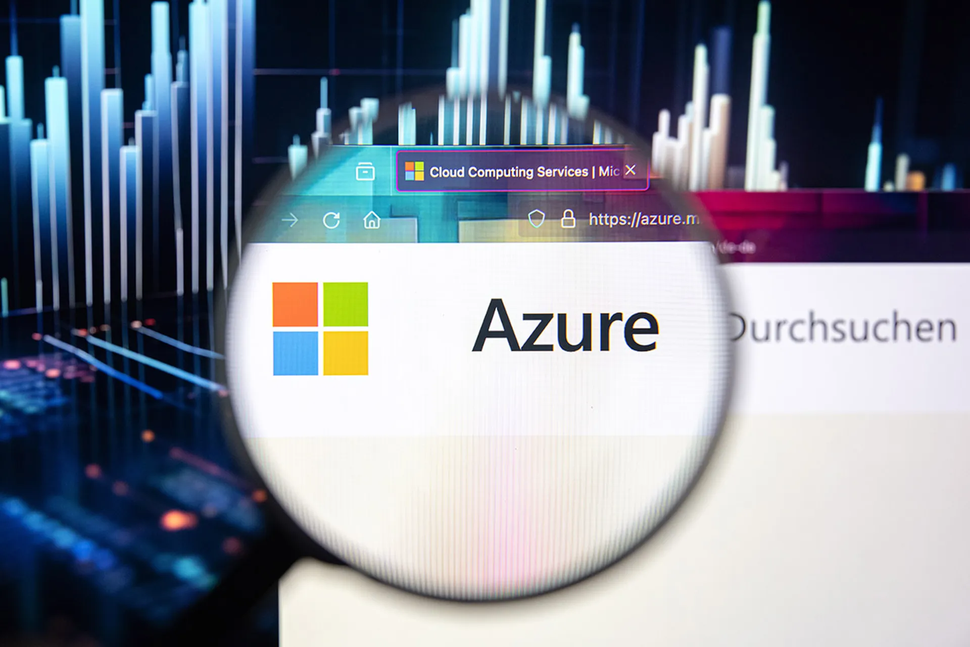 Microsoft Azure company logo on a website with blurry stock market developments in the background, seen on a computer screen through a magnifying glass.