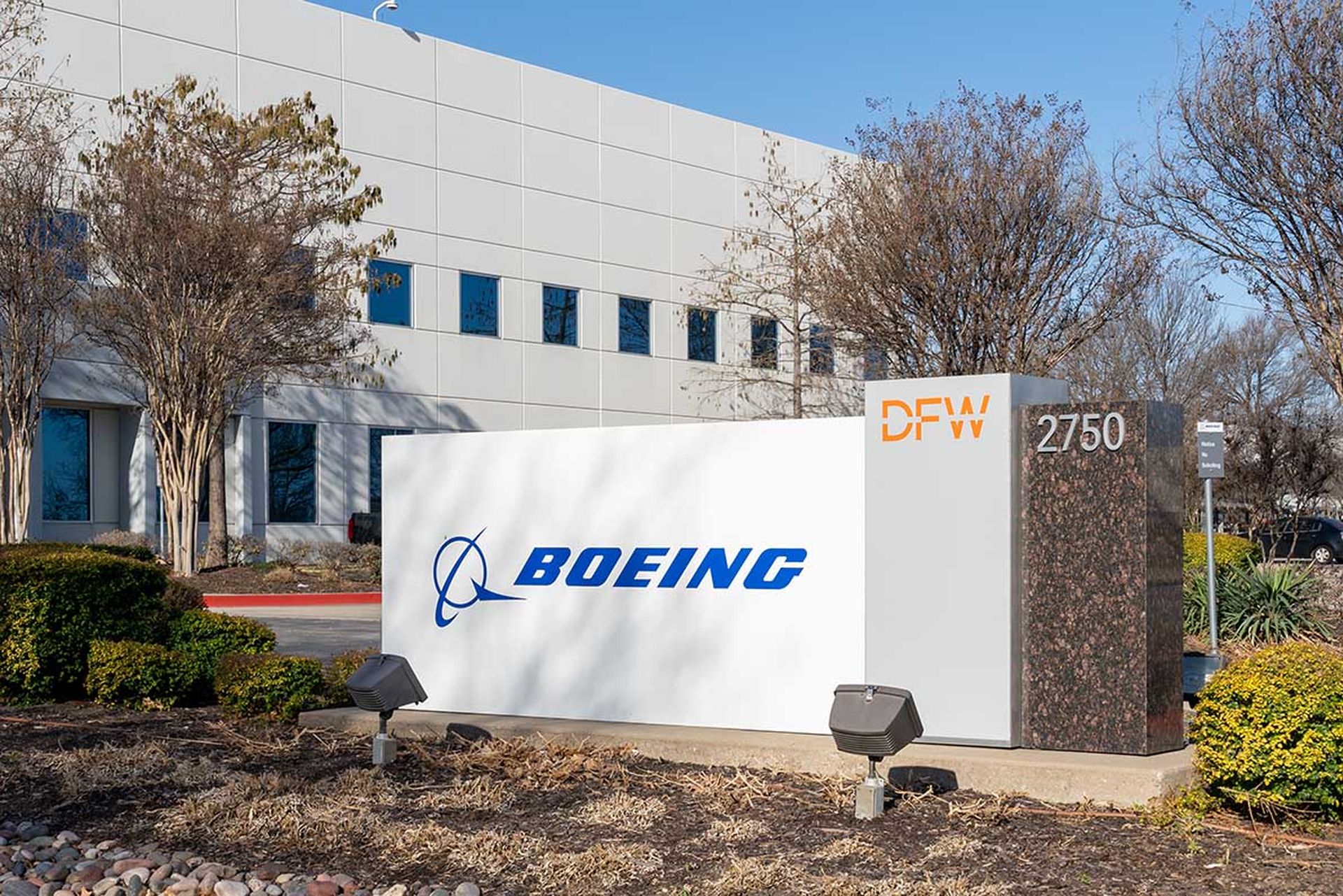 A sign with the Boeing logo is seen outside a company facility