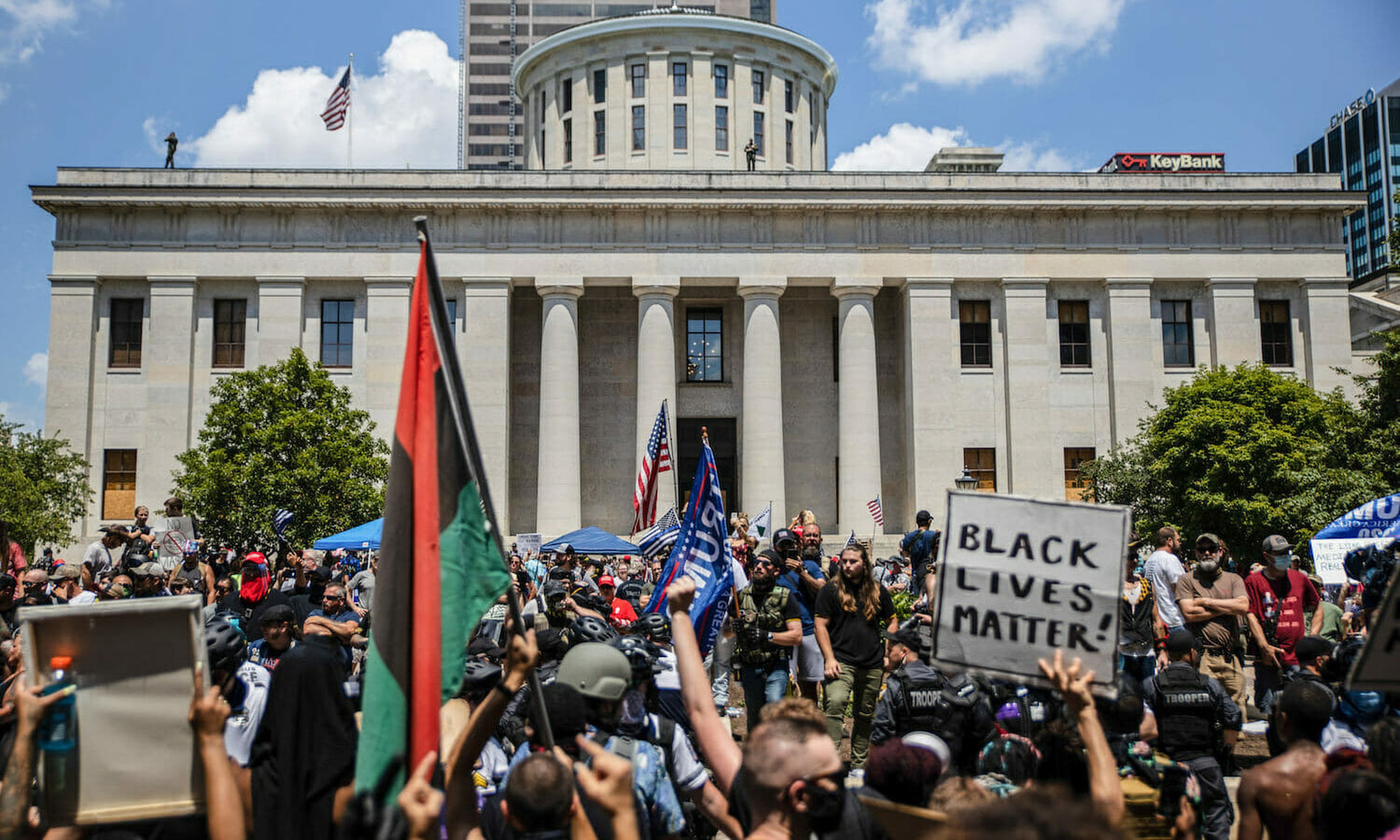 COLUMBUS, UNITED STATES &#8211; 2020/07/18: Anti-Mask protesters collide with Black Lives Matter counter-protesters during an &#8216;Anti-Mask&#8217; rally, Black Lives Matter protest at Ohio Statehouse.
Over 200 people gathered at the Ohio State House to protest against the face mask mandate that multiple counties are under in the state. (Photo by...