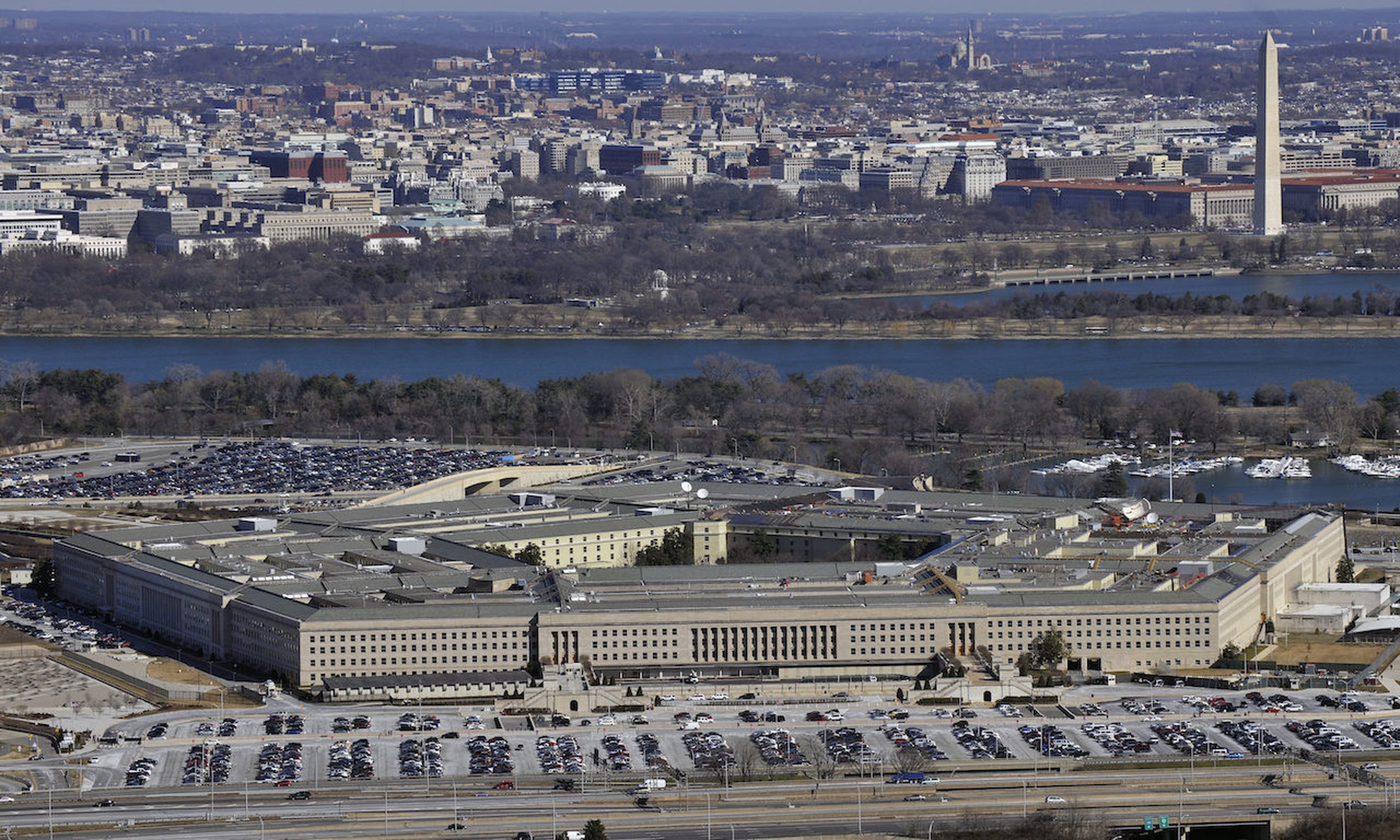The Pentagon with the Washington Monument and National Mall in the background. A proposed Cybersecurity Threat Information Collaboration Environment is designed to foster better coordination between DOD, DHS and the intelligence community around cyber threat information sharing. (U.S. Air Force Photo by Senior Airman Perry Aston)
