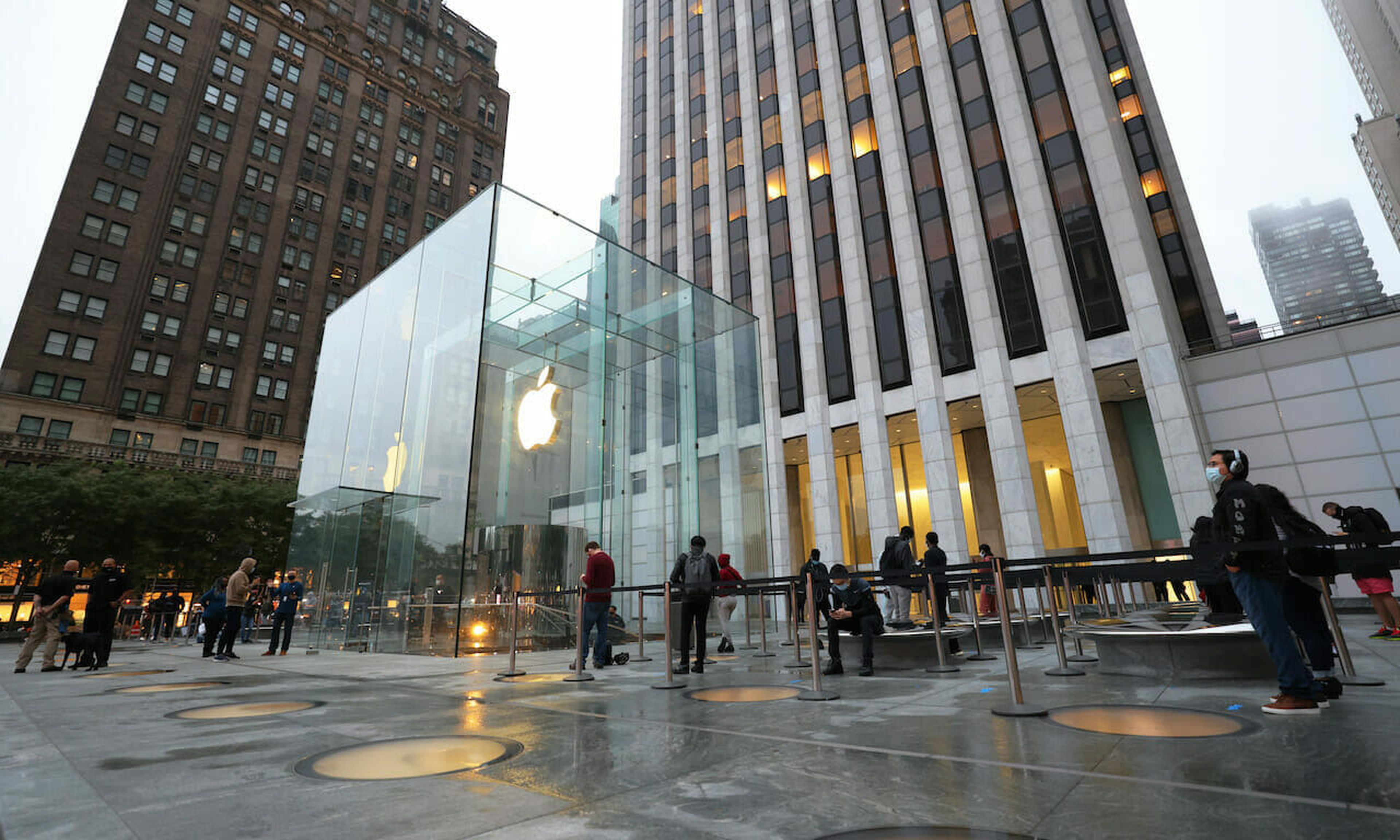 People wait in line at the Apple Fifth Avenue store for the release of the new iPhone on October 23, 2020 in New York City. The new Apple iPhone 12 was released today.  (Photo by Michael M. Santiago/Getty Images)